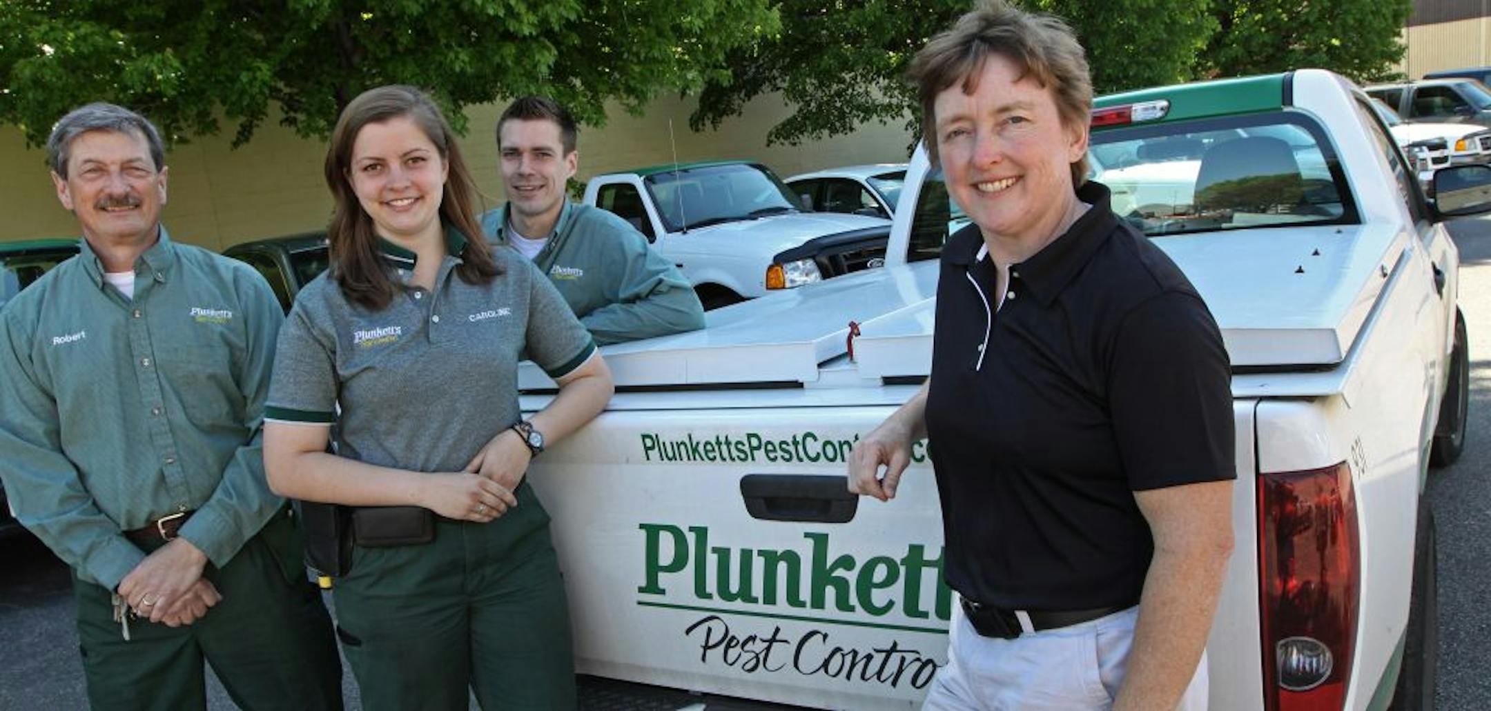 (left to right) Plunkett's Pest Control Technician's Robert Brawley (32 years service), Caroline Kirby (1 year service), Nick Puchtel (8 years service) and Stacy O'Reilly, President of Plunkett's.