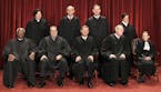 Members of the Supreme Court gather for a group portrait at the Supreme Court in Washington, Friday, Oct. 8, 2010. Seated from left are: Associate Jus