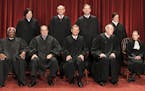 Members of the Supreme Court gather for a group portrait at the Supreme Court in Washington, Friday, Oct. 8, 2010. Seated from left are: Associate Jus