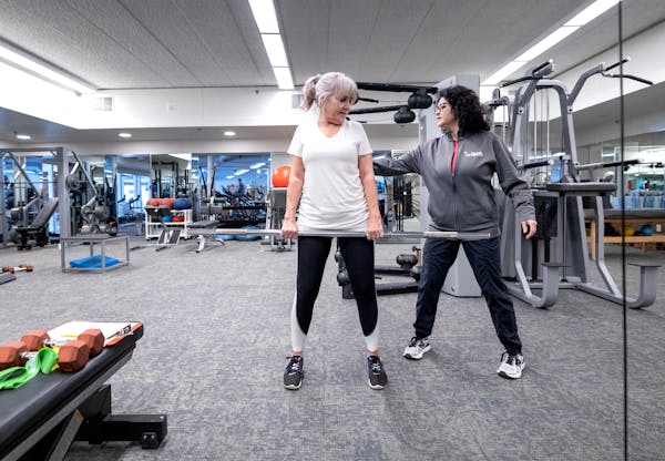 Anne Lukas Miller worked out with exercise specialist Brenda Steger on Thursday at the Marsh in Minnetonka.