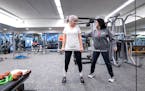 Anne Lukas Miller worked out last month with exercise specialist Brenda Steger at the Marsh. 