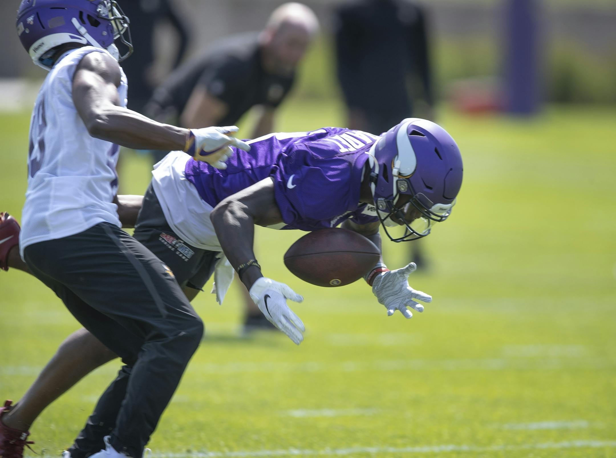 Receiver Jeff Badet bobbled the ball during the first day of training for Vikings rookies at TCO Performance Center Tuesday July,23 2019 in Eagan, MN.