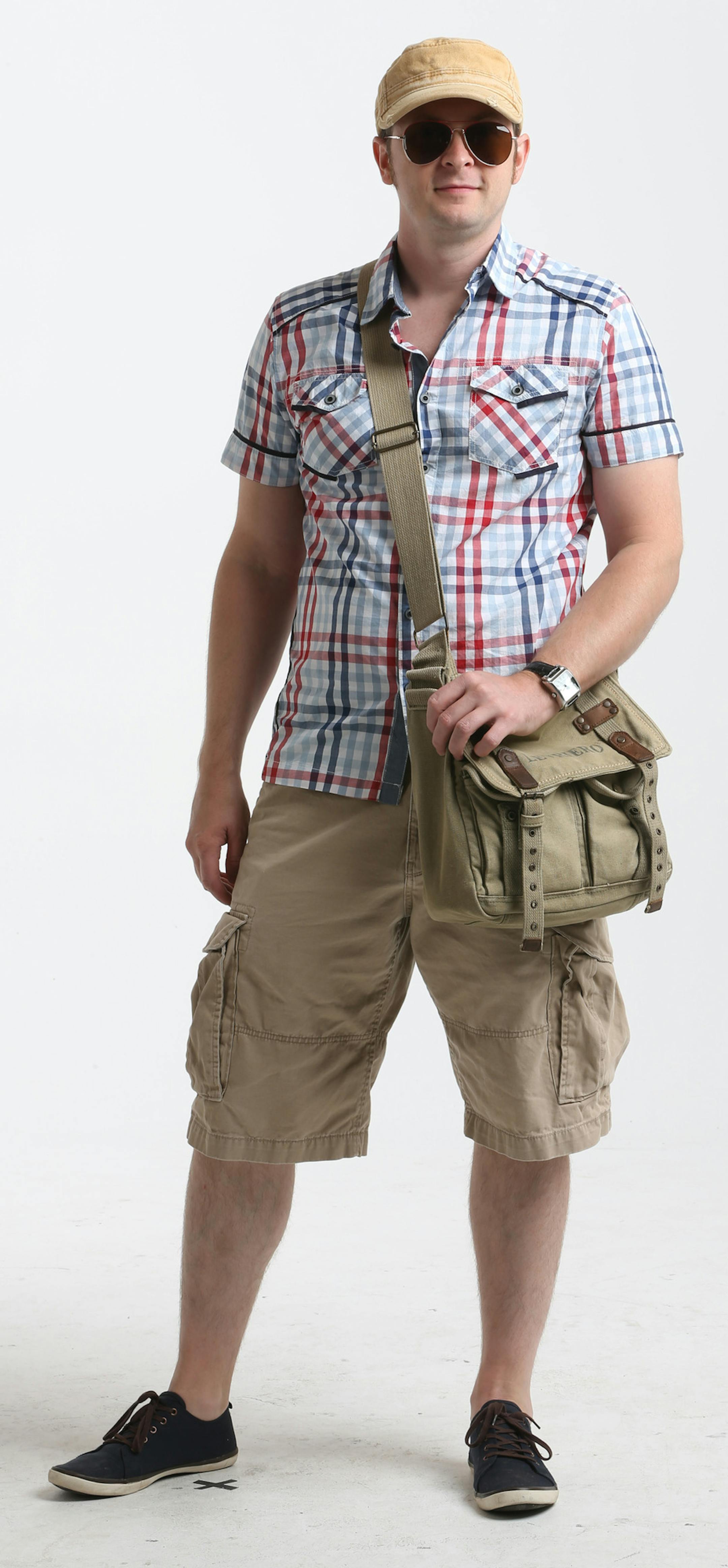 Studio photo shoot for the Variety Style page. Two models (styled by Sally McGraw) will show readers who to dress fashionably (and comfortably) for the Minnesota State Fair. Looking for full-body photos, so we can do pull-out text boxes on each clothing item (such as shoes, shorts, bags, shirts, sunglasses and hat.) Photographed on 8/15/13.] Bruce Bisping/Star Tribune bbisping@startribune.com