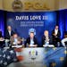 Davis Love III, center, receives applause during a news conference Tuesday, Feb. 24, 2015, at PGA of America headquarters in Palm Beach Gardens, Fla.L