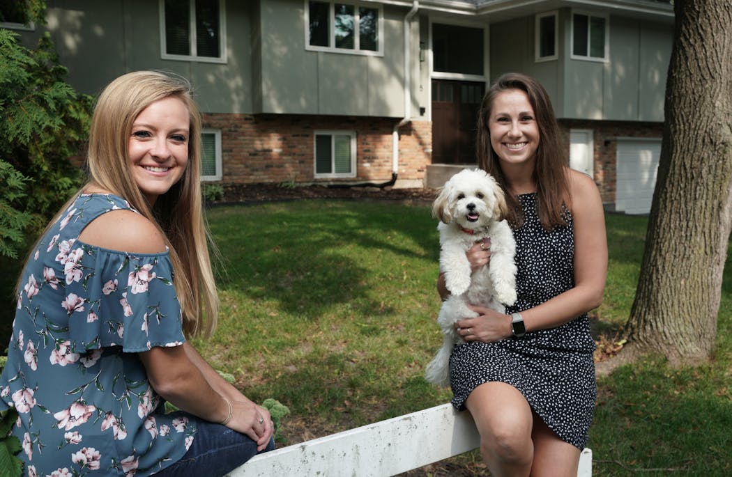 The pandemic prompted Lizzie Schimmel (left) and Lesley with dog Henri left downtown and purchased a house in Minnetonka.