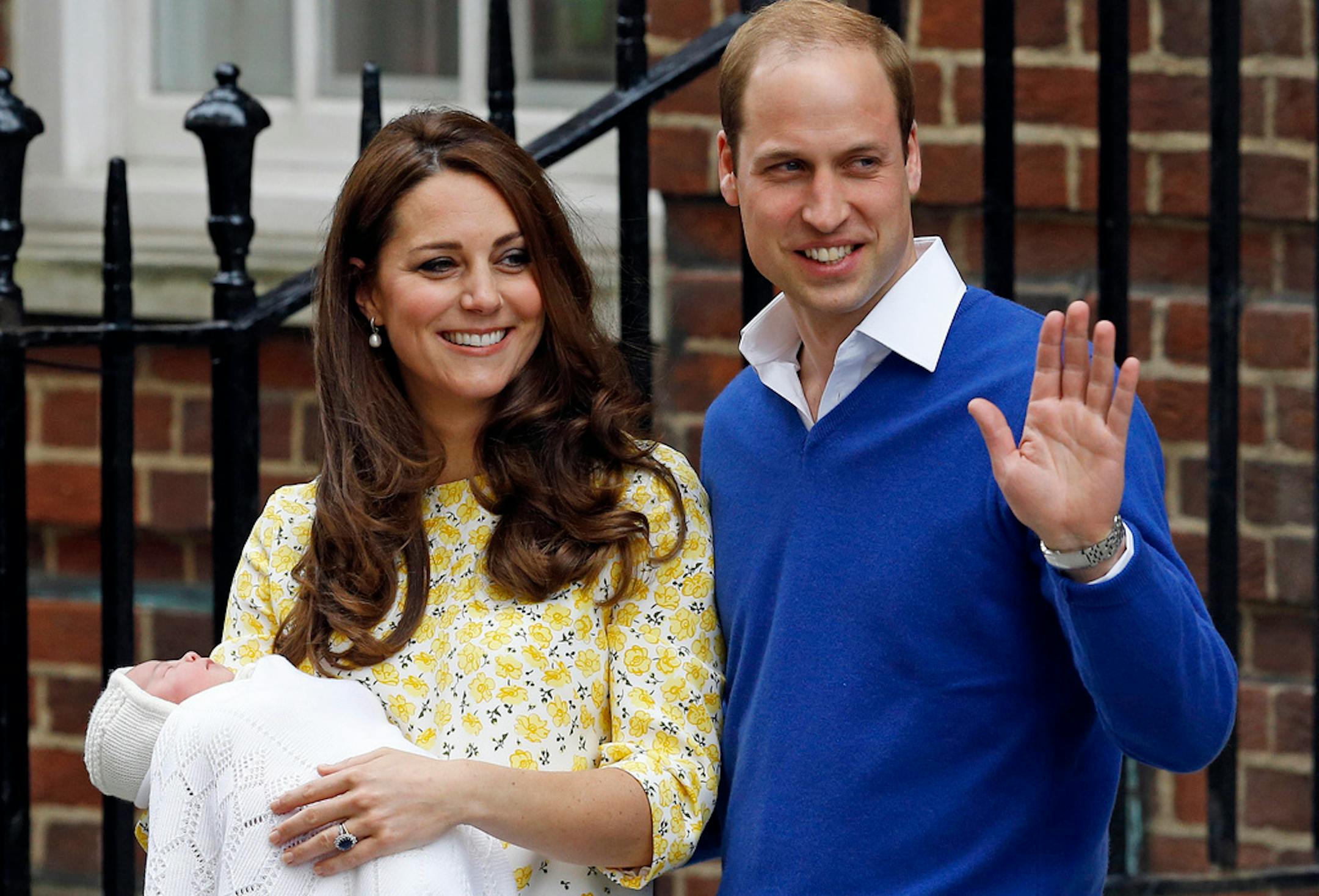 FOR USE AS DESIRED, YEAR END PHOTOS - FILE - Britain's Prince William and Kate, Duchess of Cambridge and their newborn baby princess, pose for the media as they leave St. Mary's Hospital's exclusive Lindo Wing, London, Saturday, May 2, 2015. (AP Photo/Kirsty Wigglesworth, File) ORG XMIT: NYYE152