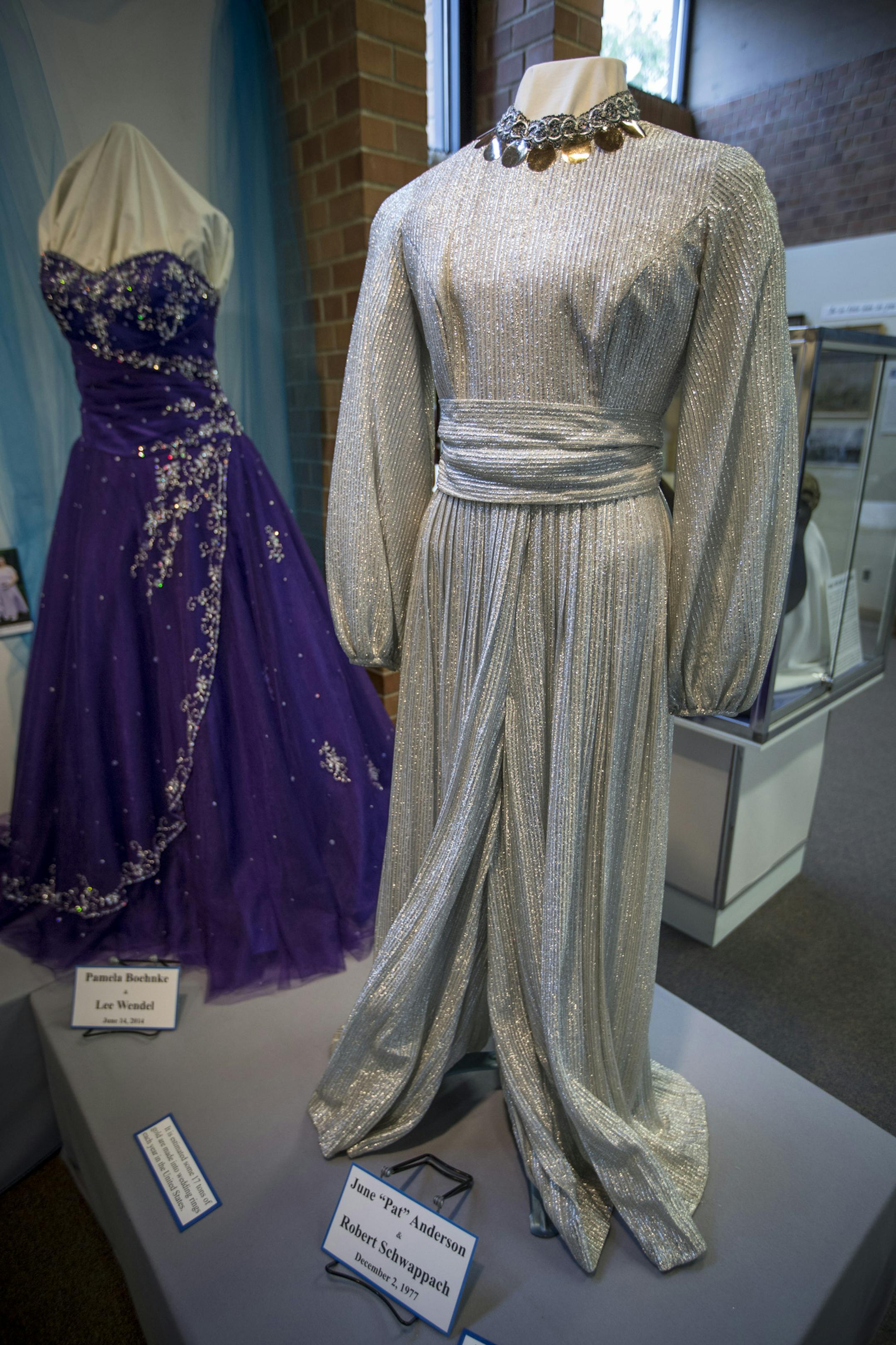 A wedding dress that is a pantsuit from 1977 that is part of an exhibit of historical wedding dresses at the Anoka County Historical Society Museum in Anoka, Minn., on Tuesday, July 28, 2015. ] RENEE JONES SCHNEIDER • reneejones@startribune.com