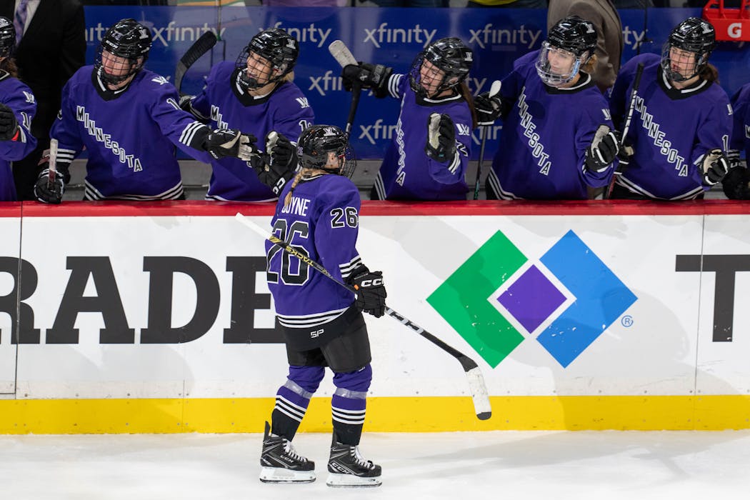The bench congratulated Minnesota forward Kendall Coyne Schofield (26) after she scored in the third period of the PWHL game between Minnesota and Toronto at Xcel Energy Center in St. Paul on Jan. 10.