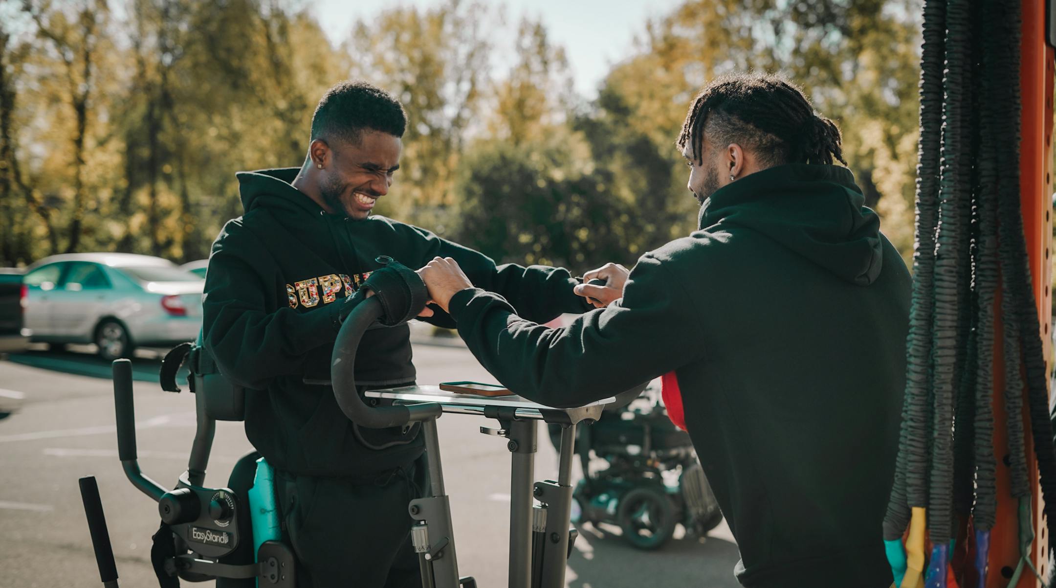 Jordan Bolton, left, attends Courage Kenny Rehabilitation Institute six hours a day, six days a week. Here, he gets an assist from best friend and major motivator Gary Trent Jr.