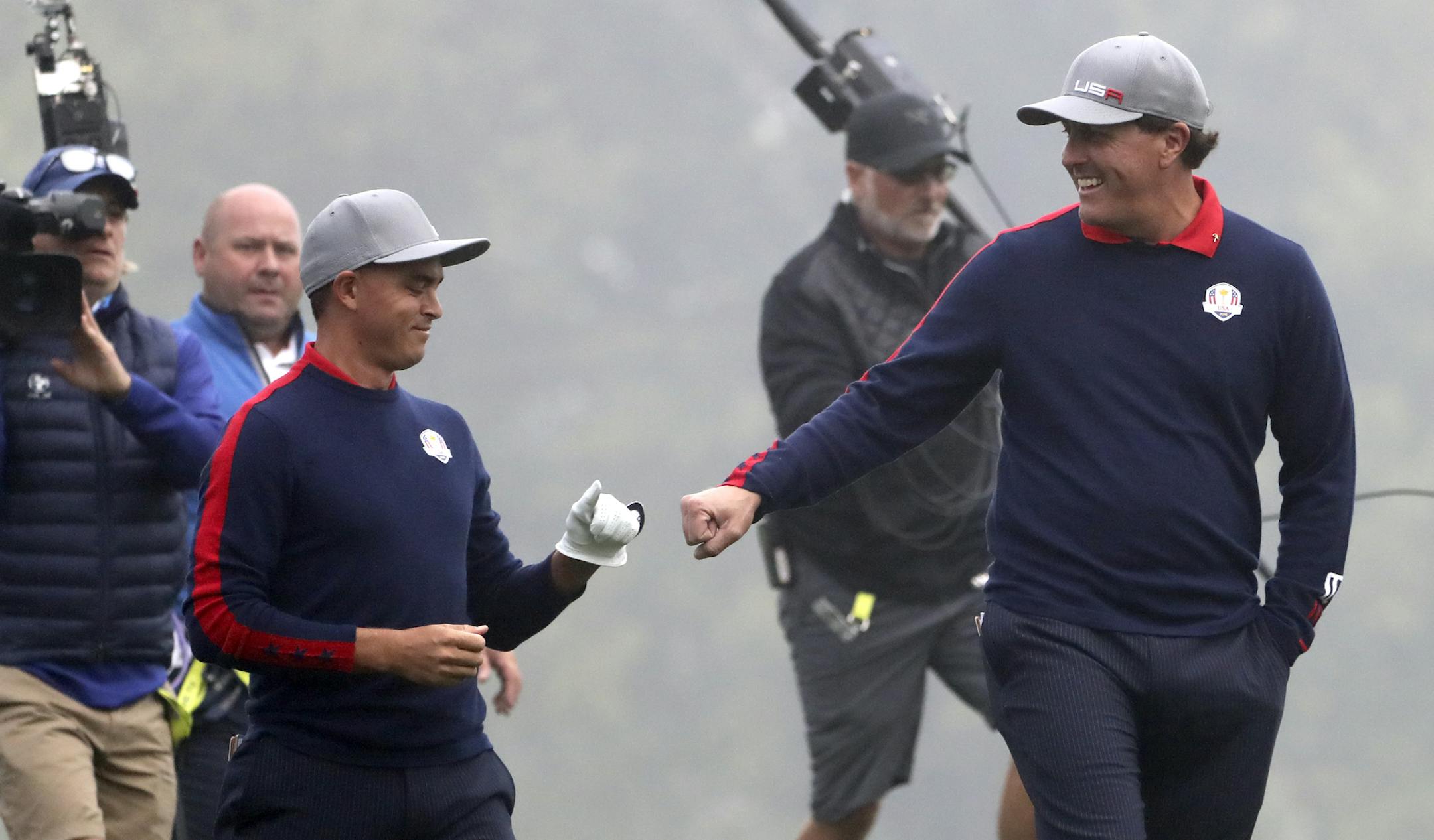 Rickie Fowler and Phil Mickelson fist pump as they come back in their match during the 2016 Ryder Cup, Friday morning Play at Hazeltine National Golf Club in Chaska, Minnesota, with foursomes competition. ] 2016 Ryder Cup, Hazeltine National Golf Club. Chaska, MN 9/30/16 BRIAN PETERSON brian.peterson@startribune.com