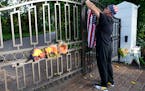 John Hensel attached an American flag to the gate of the Palm Beach, Fla., home of his friend and talk radio host Rush Limbaugh. Limbaugh died on Wedn
