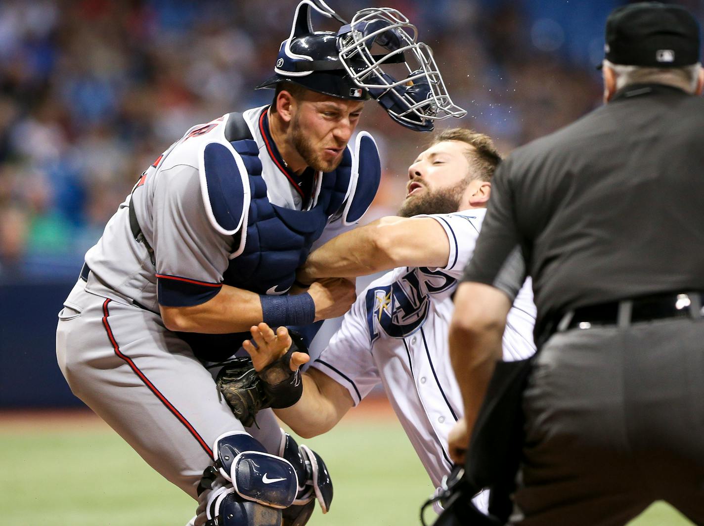 The Rays' Steven Souza Jr. collided with Twins catcher Mitch Garver as he scored on a sacrifice fly by Adeiny Hechavarria in the sixth inning of Tampa Bay's 11-4 victory at Tropicana Field on Monday.