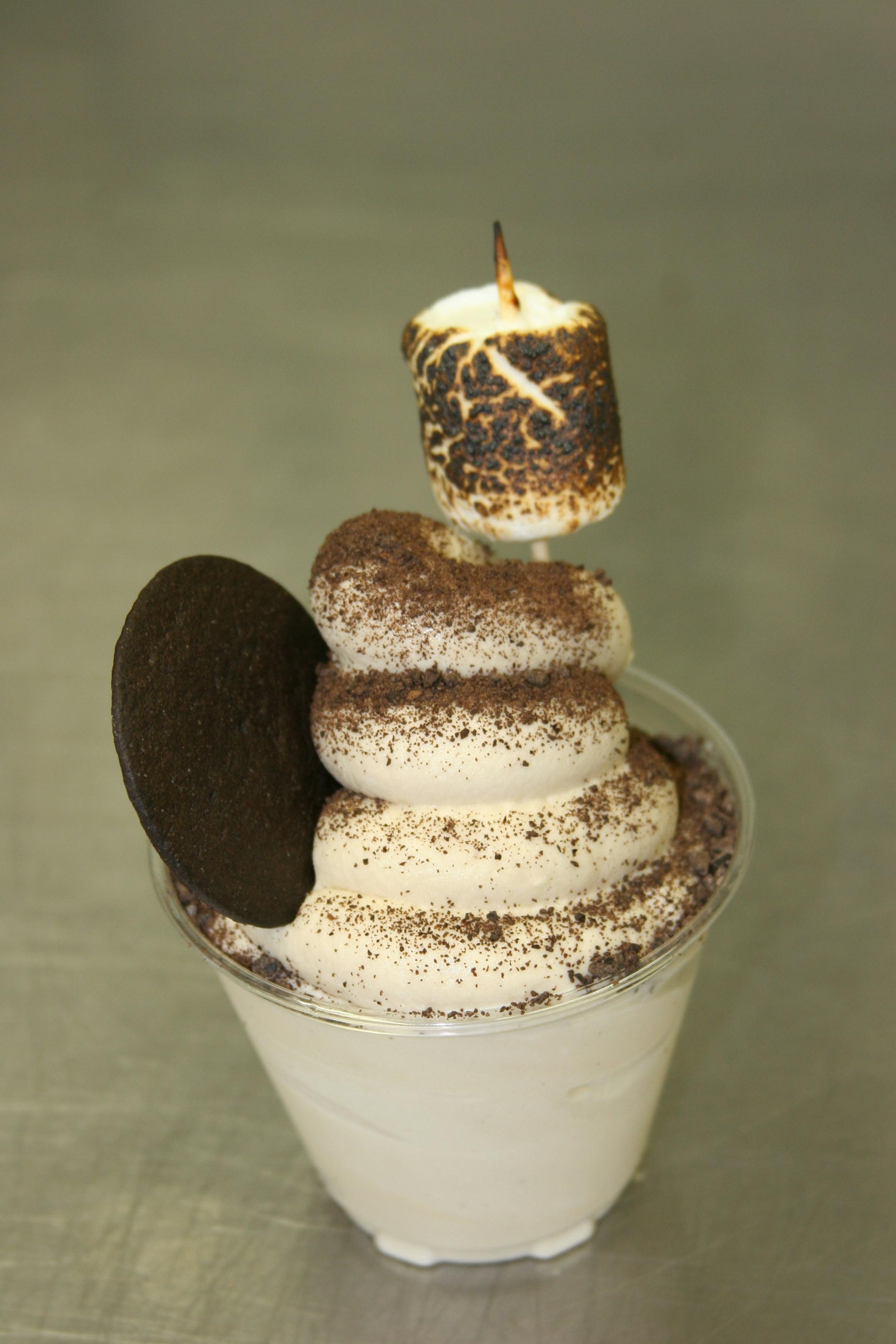Smoked Soft Serve Ice Cream: Cold-smoked cream available in two flavors, all made on-site:
• Cold Brew Coffee infused with cold-smoked Arabica beans and topped with chocolate espresso dust, a toasted marshmallow and a chocolate cookie on the side
• Muscovado Sugar Vanilla combines vanilla bean and cold-smoked molasses-rich cane sugar served with a toasted marshmallow and bacon candy round on the side
At Blue Moon Dine-In Theater, located on the northeast corner of Carnes Av. & Chambers St.