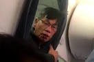 David Dao is shown during an incident on a United Airlines flight in a YouTube video.