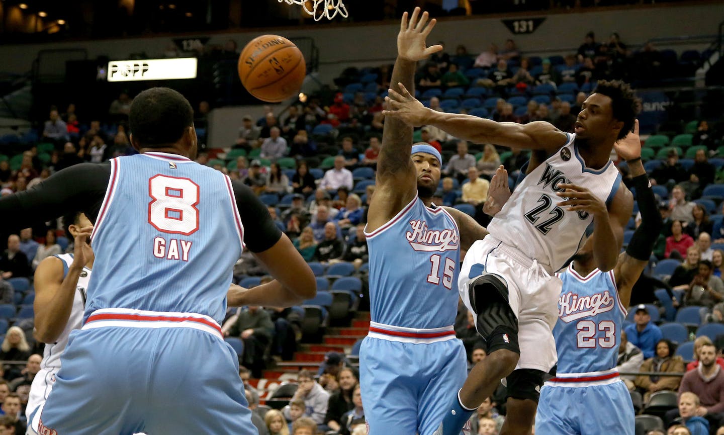 Andrew Wiggins passed the ball after driving to the basket during the first half.