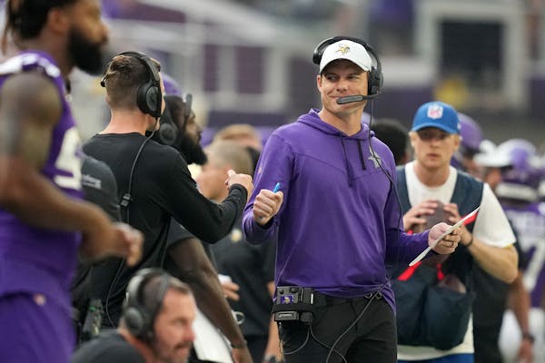 Vikings head coach Kevin O'Connell smiles on the sidelines ahead of Saturday's preseason game vs. San Francisco