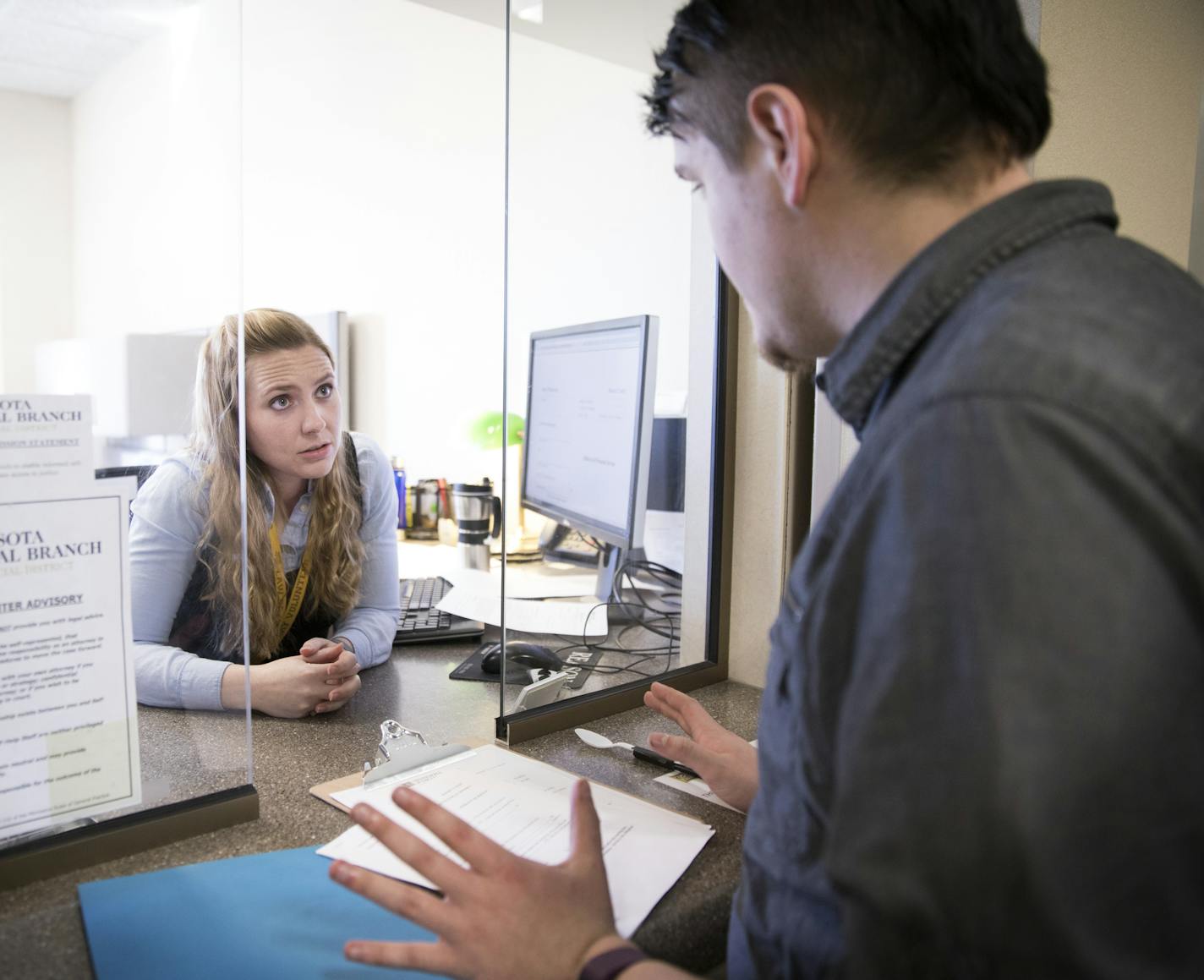 Self Help Center attorney Molly Buckrey helps Brock Holland, right, at the Legal Self-Help Center. ] LEILA NAVIDI &#xef; leila.navidi@startribune.com BACKGROUND INFORMATION: The Legal Self-Help Center located at the Anoka County Courthouse in Anoka on Tuesday, March 28, 2017. A look at a new but growing legal self-help center program in the tenth judicial district. While other counties run similar centers, officials from the tenth judicial district say theirs is now the most comprehensive progra