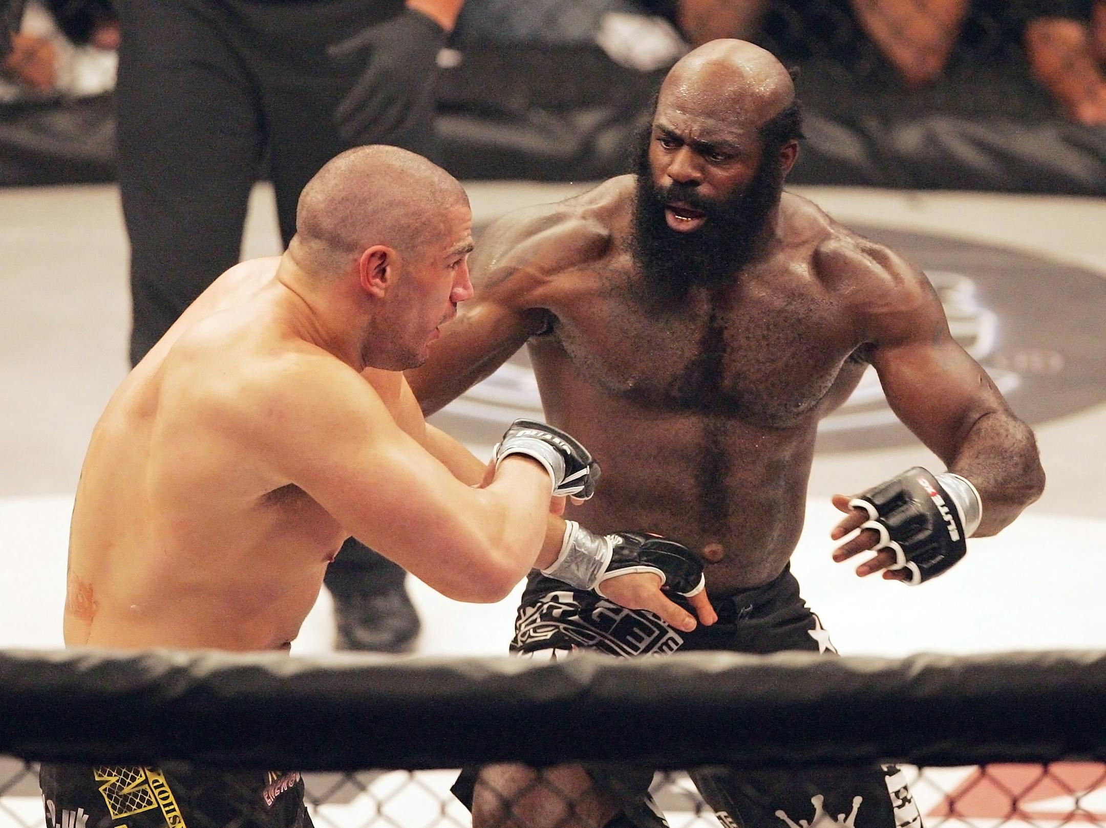 This May 31, 2008, file photo shows Kimbo Slice, right, battling James Thompson of Manchester, England during their EliteXC heavyweight bout at the Prudential Center in Newark, N.J. Slice, a street-fighting sensation from Miami whose fisticuffs went viral on YouTube, has died, according to the president of Bellator, at age 42.
