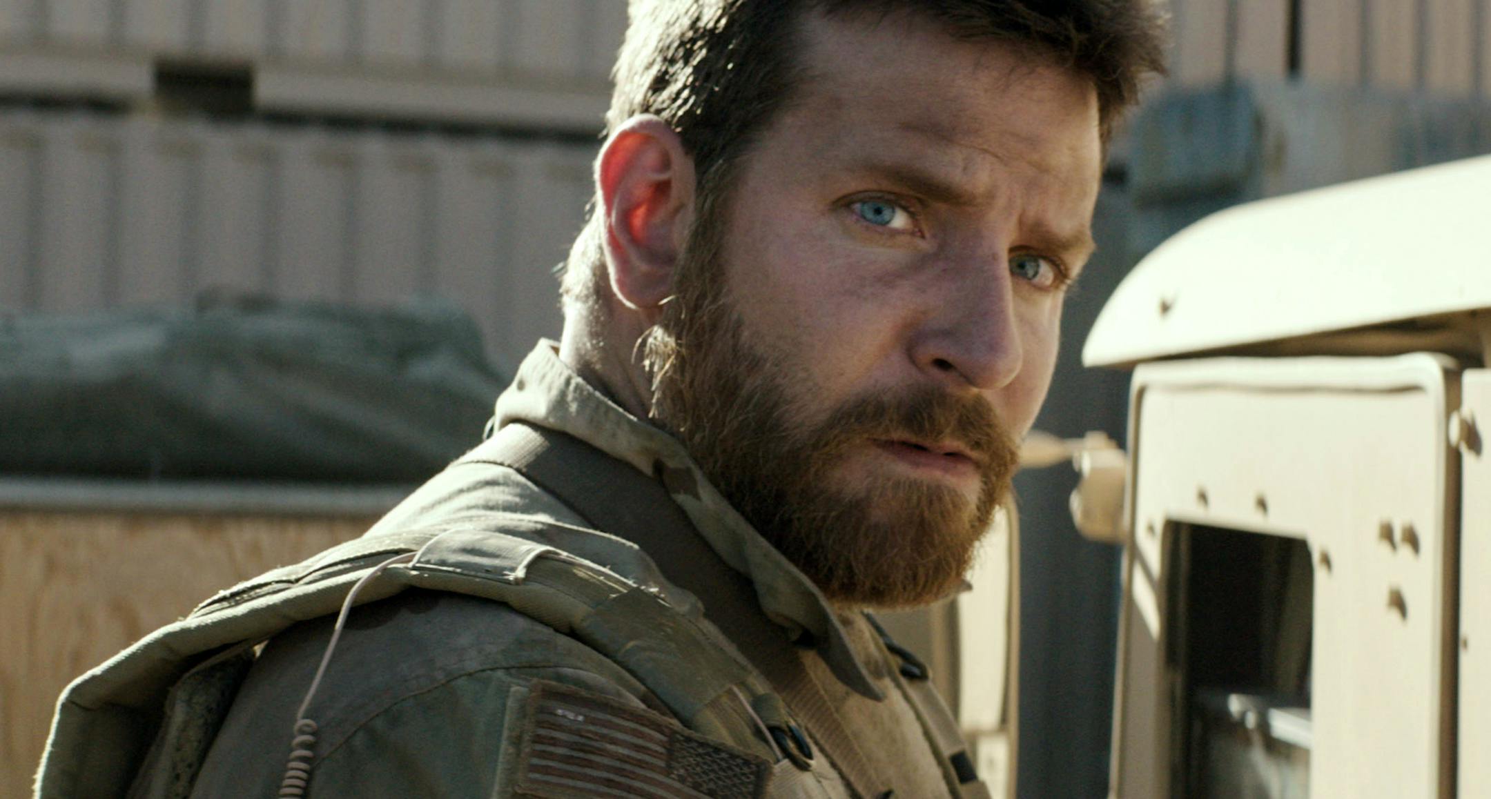In this image released by Warner Bros. Pictures, Bradley Cooper appears in a scene from "American Sniper." The film was nominated for an Oscar Award for best feature on Thursday, Jan. 15, 2015. The 87th Annual Academy Awards will take place on Sunday, Feb. 22, 2015 at the Dolby Theatre in Los Angeles. (AP Photo/Warner Bros. Pictures) ORG XMIT: NYET404