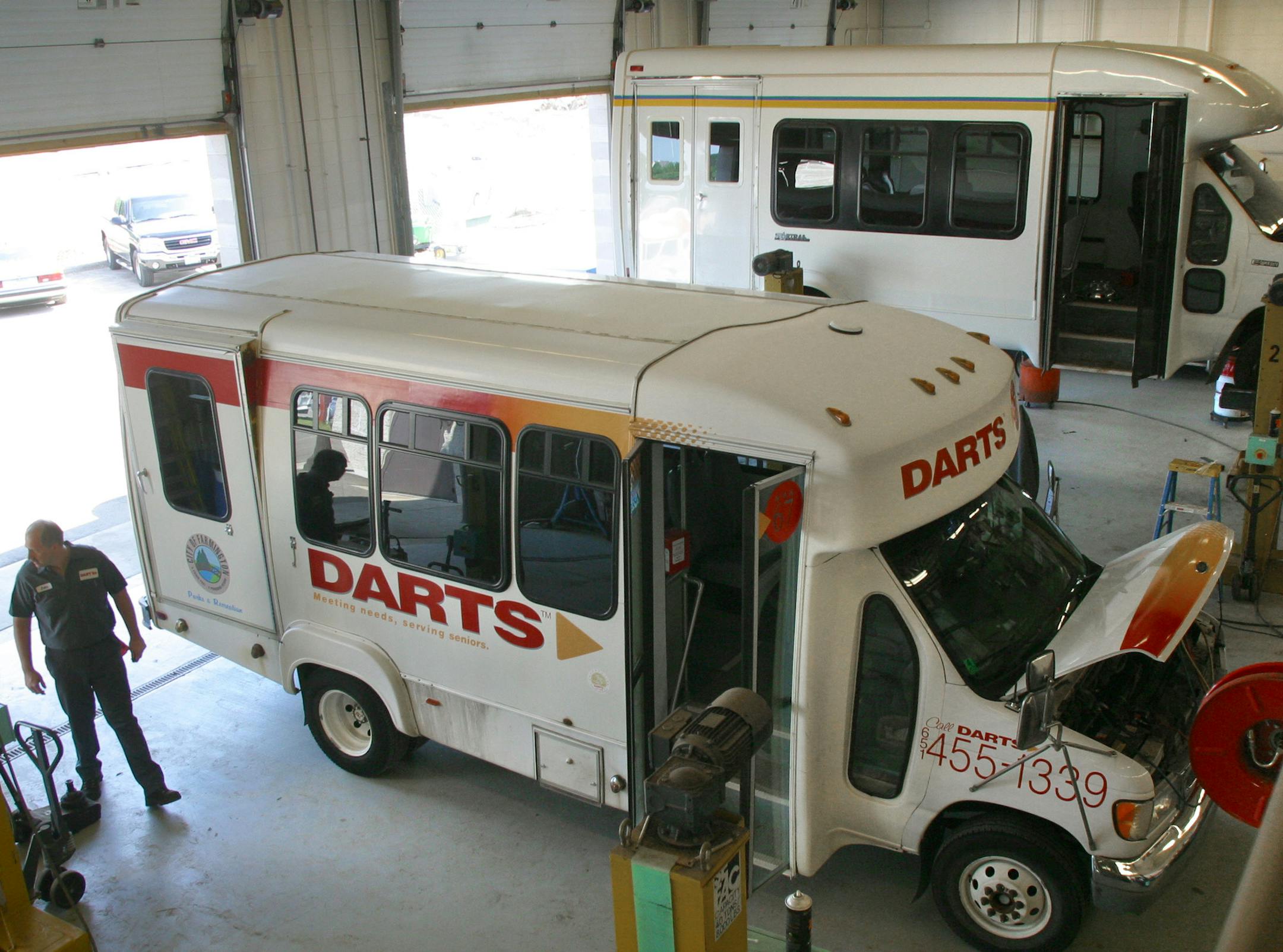 Bruce Bisping/Star Tribune. West St. Paul, MN., Wednesday, 6/30/2004. The garage at DARTS, a non-profit started thirty years ago to provide transportation services to older people in Dakota County, provides maintenance and mechanic service to over sixty other non-profit clients in the Twin Cities.