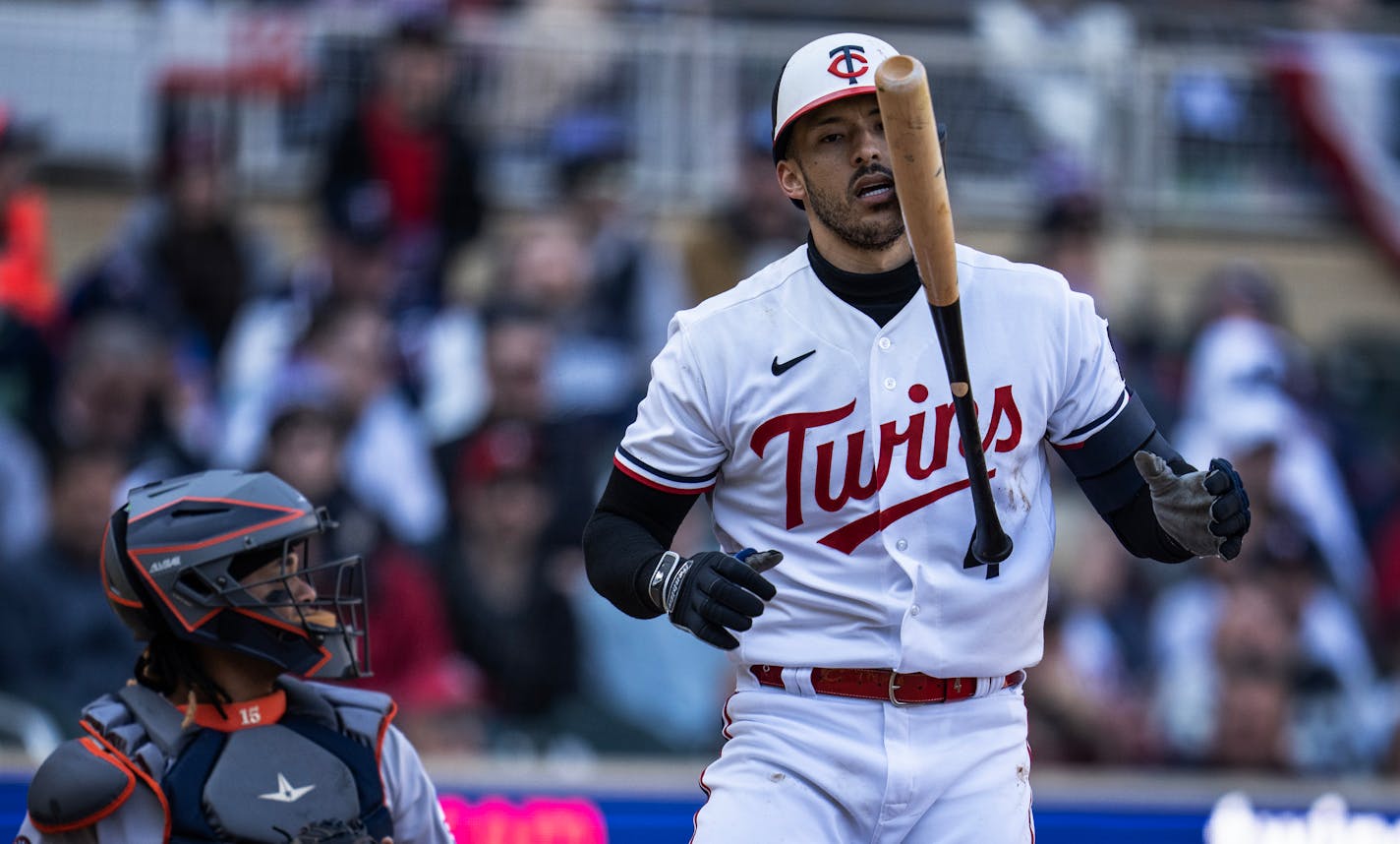 Minnesota Twins shortstop Carlos Correa (4) tossed his bat after striking out in Friday April 7,2023 in Minneapolis, Minn.] JERRY HOLT • jerry.holt@startribune.come