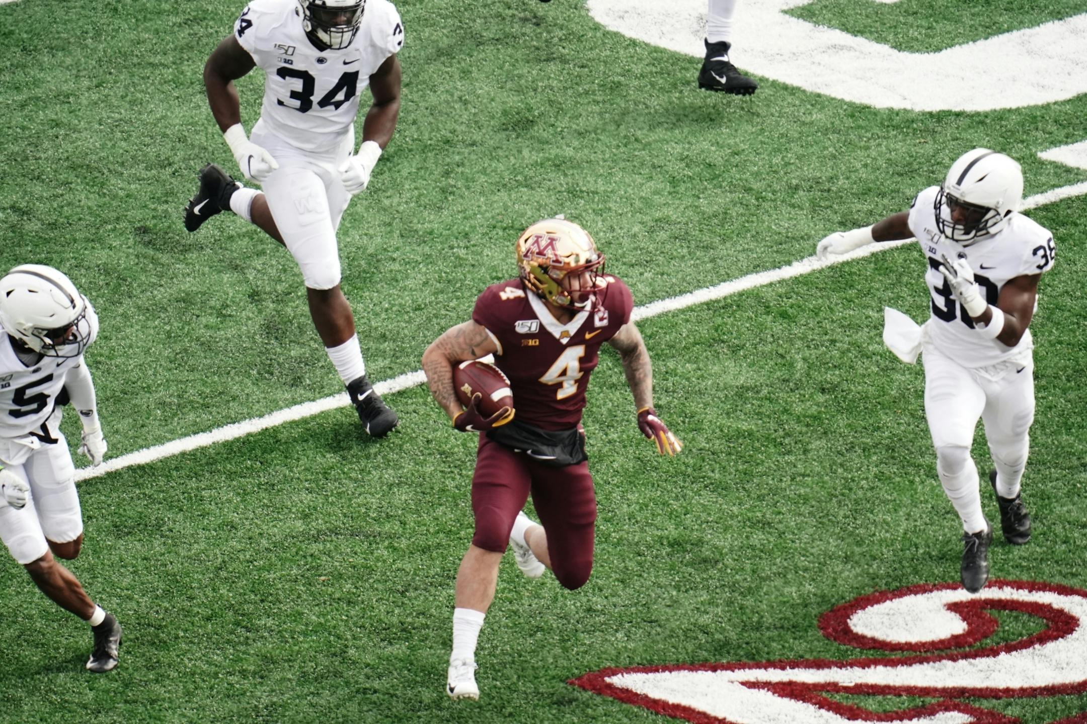 Minnesota Golden Gophers running back Shannon Brooks (4) made a 22 yard carry in the second quarter.