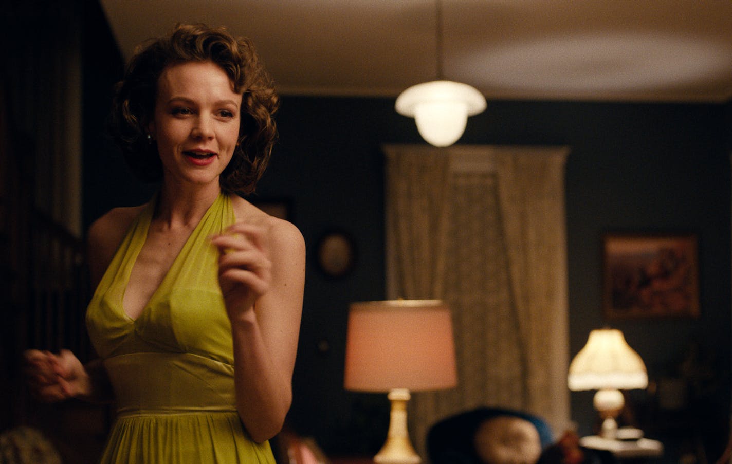 This image released by IFC Films shows Carey Mulligan in a scene from "Wildlife." (IFC Films via AP)