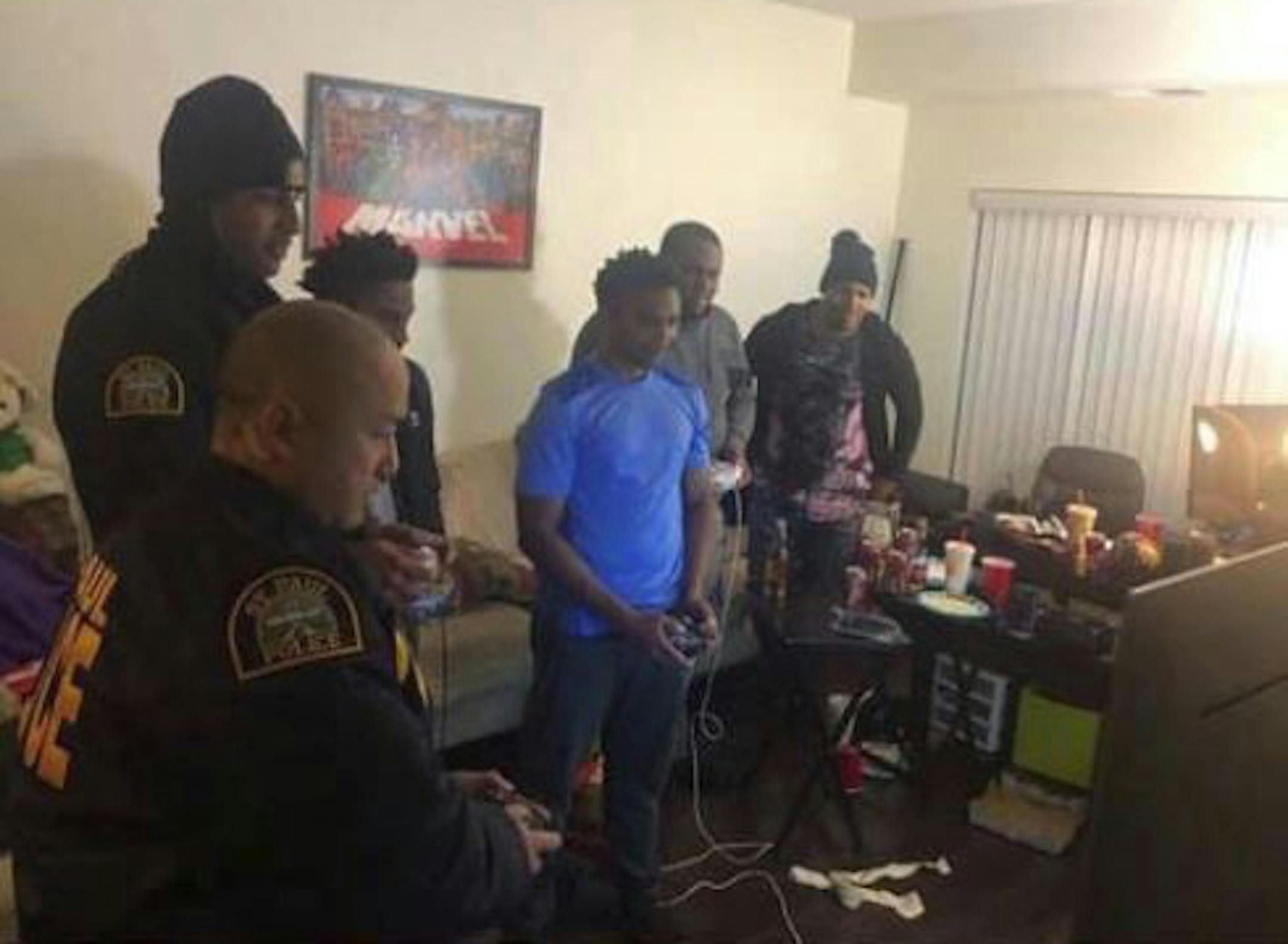 St. Paul police officers responding to a noise complaint were invited inside to play video games Friday night, captured in a Facebook post by Jovante Williams that has gone viral.