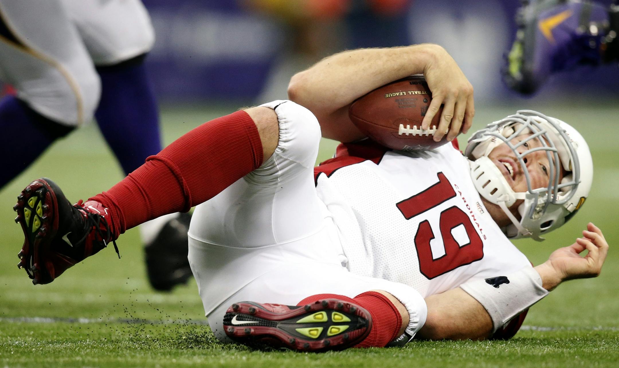Cardinals quarterback John Skelton (19) was sacked by Jared Allen (69) in the third quarter.