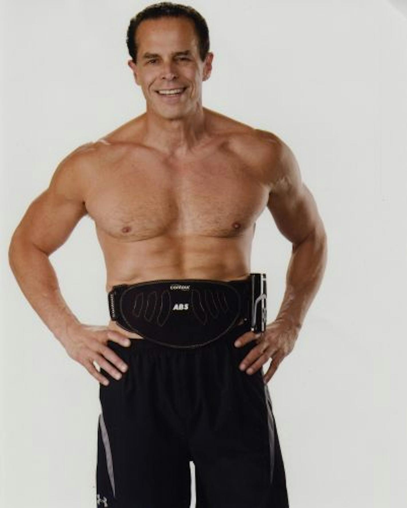 Ken Sherman, who was 57 when this photo was taken in 2007, was so impressed with the way an electrical stimulator toned his body that he acquired a similar technology and co-founded Contour Technology. He's wearing the belt the company markets.