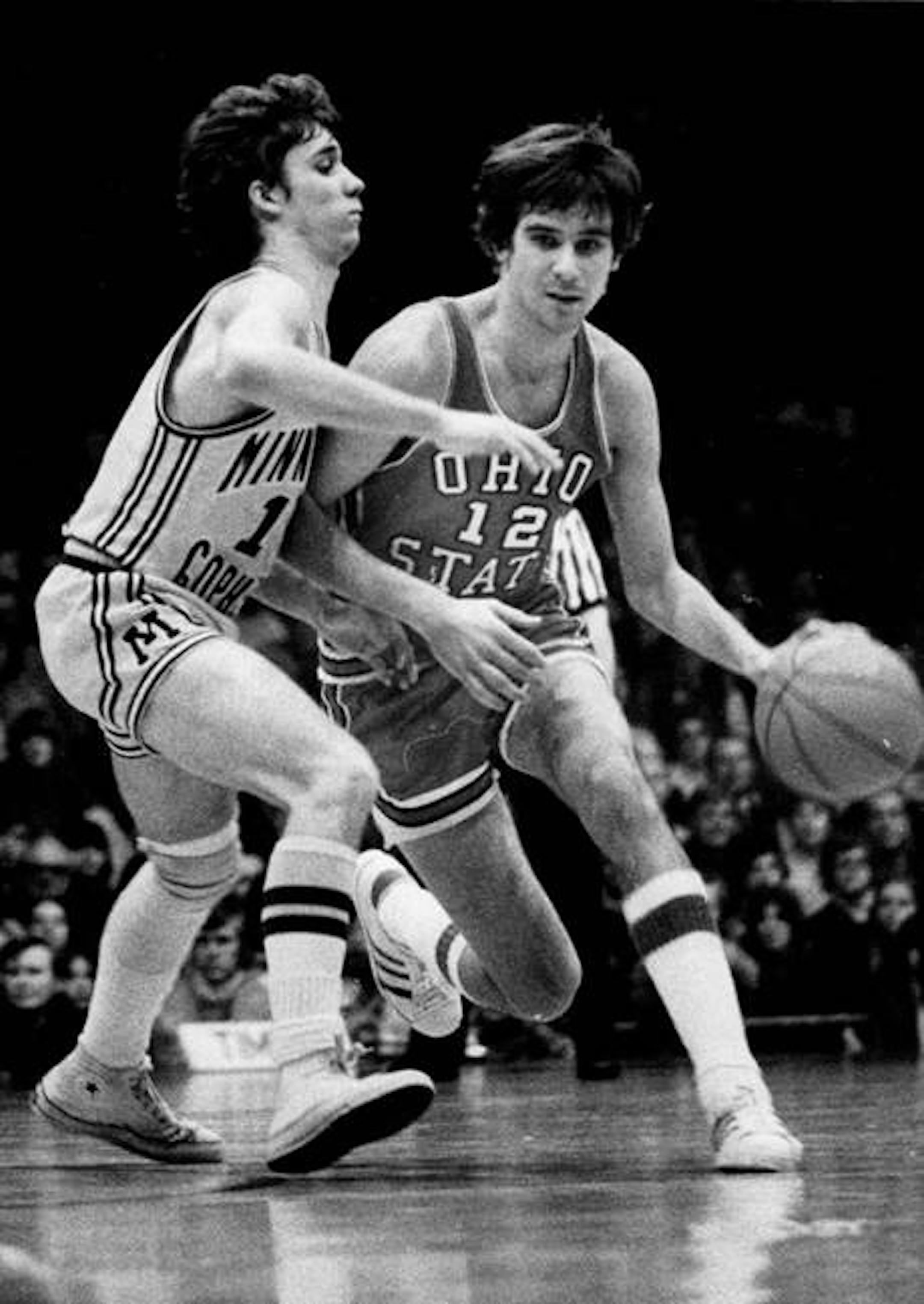 Minnesota Gopher Flip Saunders defends an Ohio State player during one of his games played as a gopher.