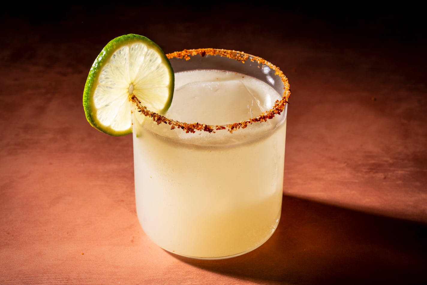 Spicy Margarita, with Taj'n Cl'sico seasoning on the rim. MUST CREDIT: Photo for the Washington Post by Scott Suchman