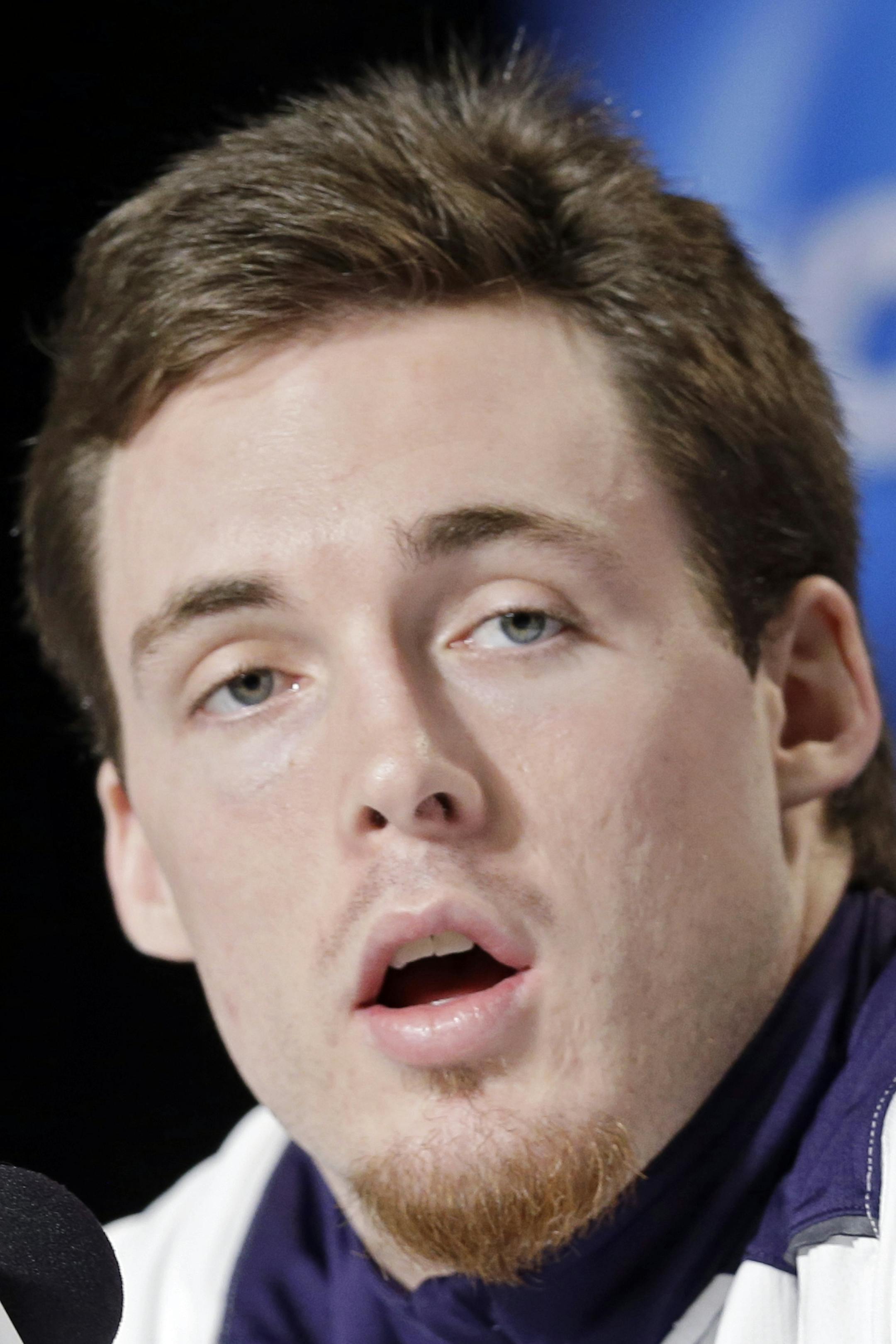 Notre Dame's Pat Connaughton answers question during the team's news conference at the NCAA men's basketball tournament regional, Friday, March 27, 2015, in Cleveland. Notre Dame plays unbeaten Kentucky, Saturday with the winner advancing to the Final Four. (AP Photo/Tony Dejak)