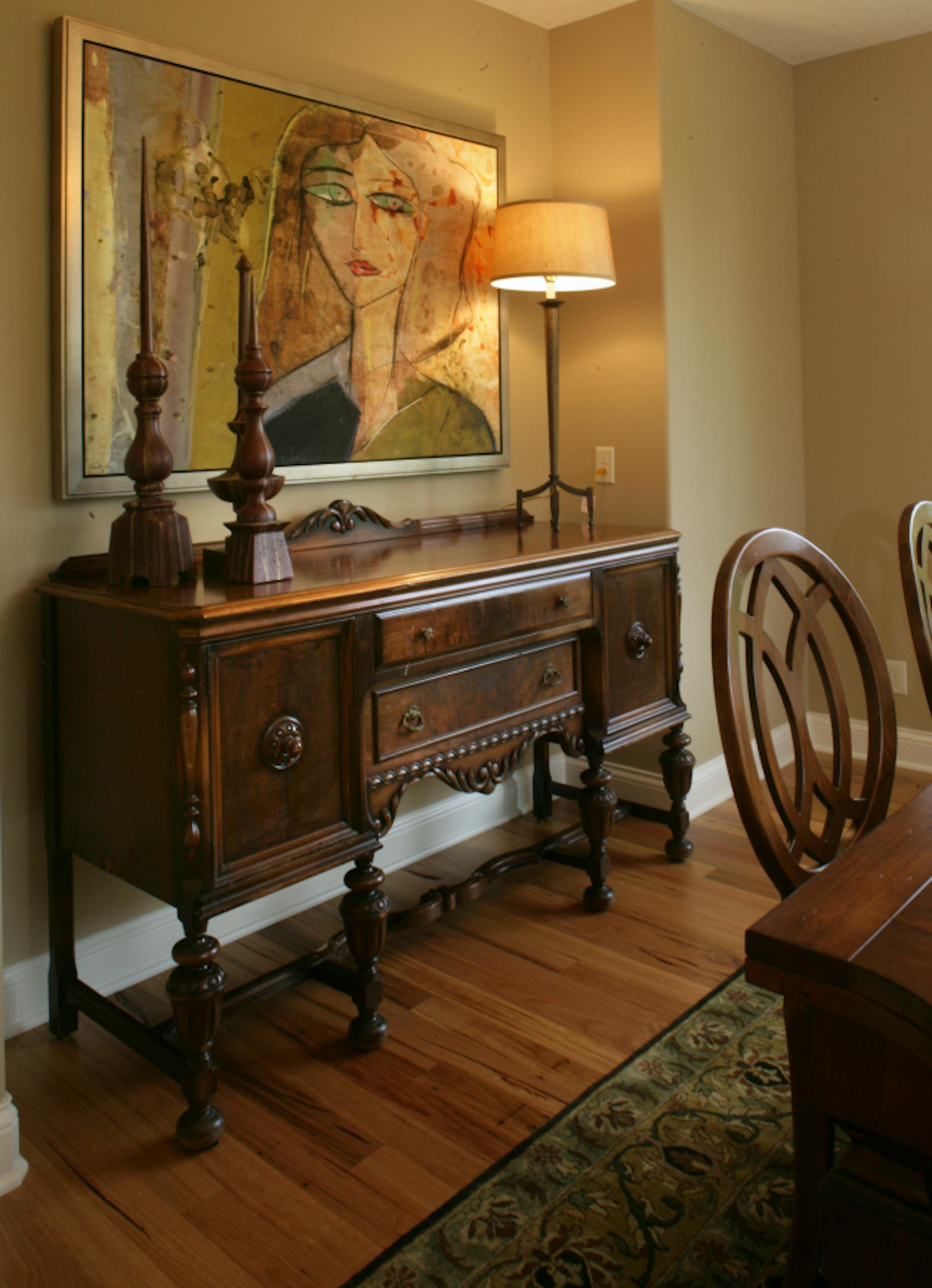 joel koyama'jkoyama@startribune.com dukes0907 20014100a  A living room in a Parade home decorated with thrift-store finds.  :]  The buffet at this Chanhassen, Mn home is located just off the dining room was furnished by Bridging, art is from International Market Square and the furnishings are from Francis King.