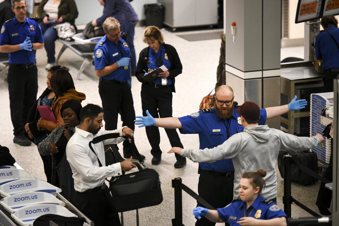 TSA employees worked without pay Tuesday at Terminal 1 at Minneapolis-St. Paul International Airport.