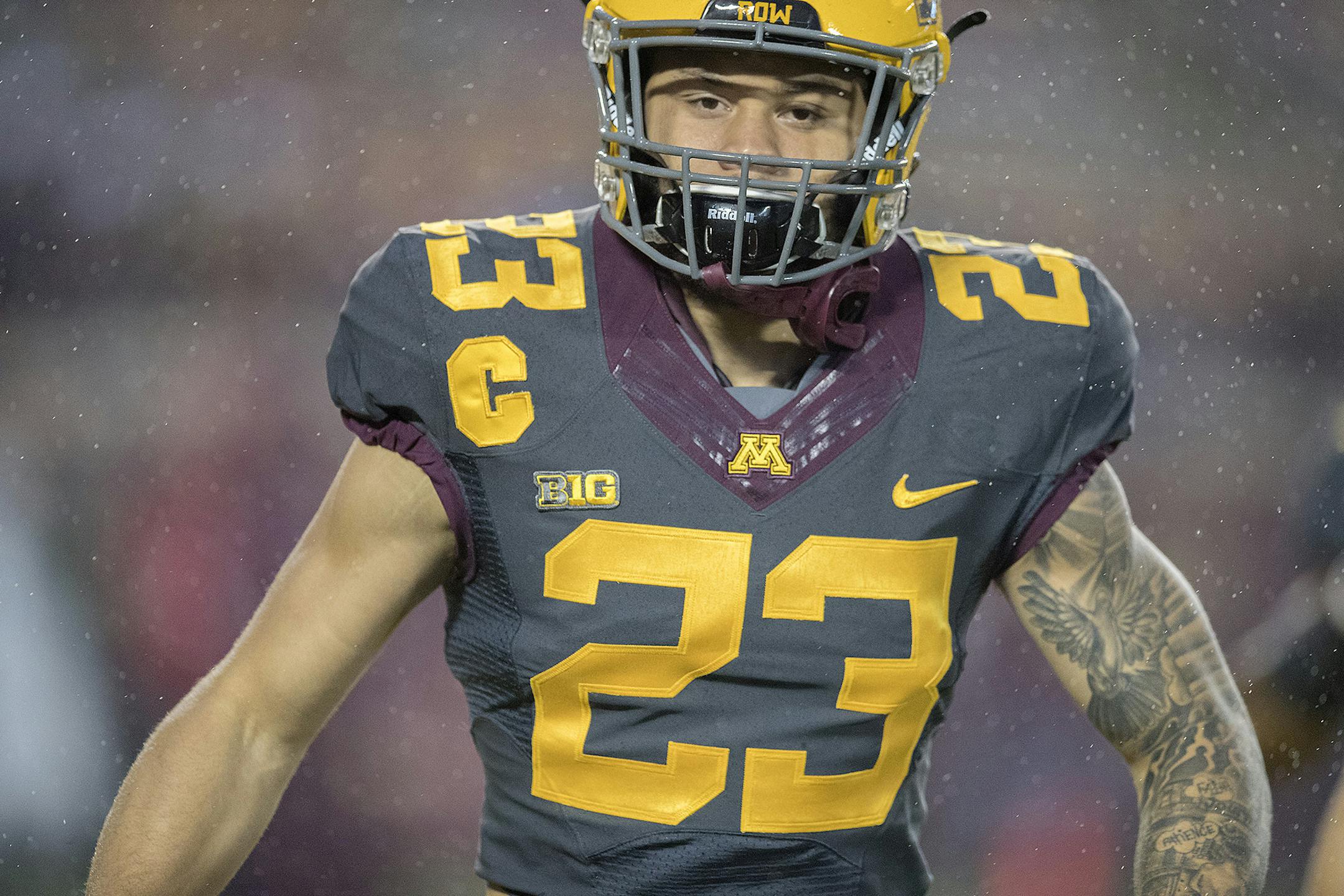 Minnesota's running back Shannon Brooks warmed up in the rain before the Gophers took on Michigan State at TCF Bank Stadium, Saturday, October 14, 2017 in Minneapolis, MN. ] ELIZABETH FLORES &#xef; liz.flores@startribune.com