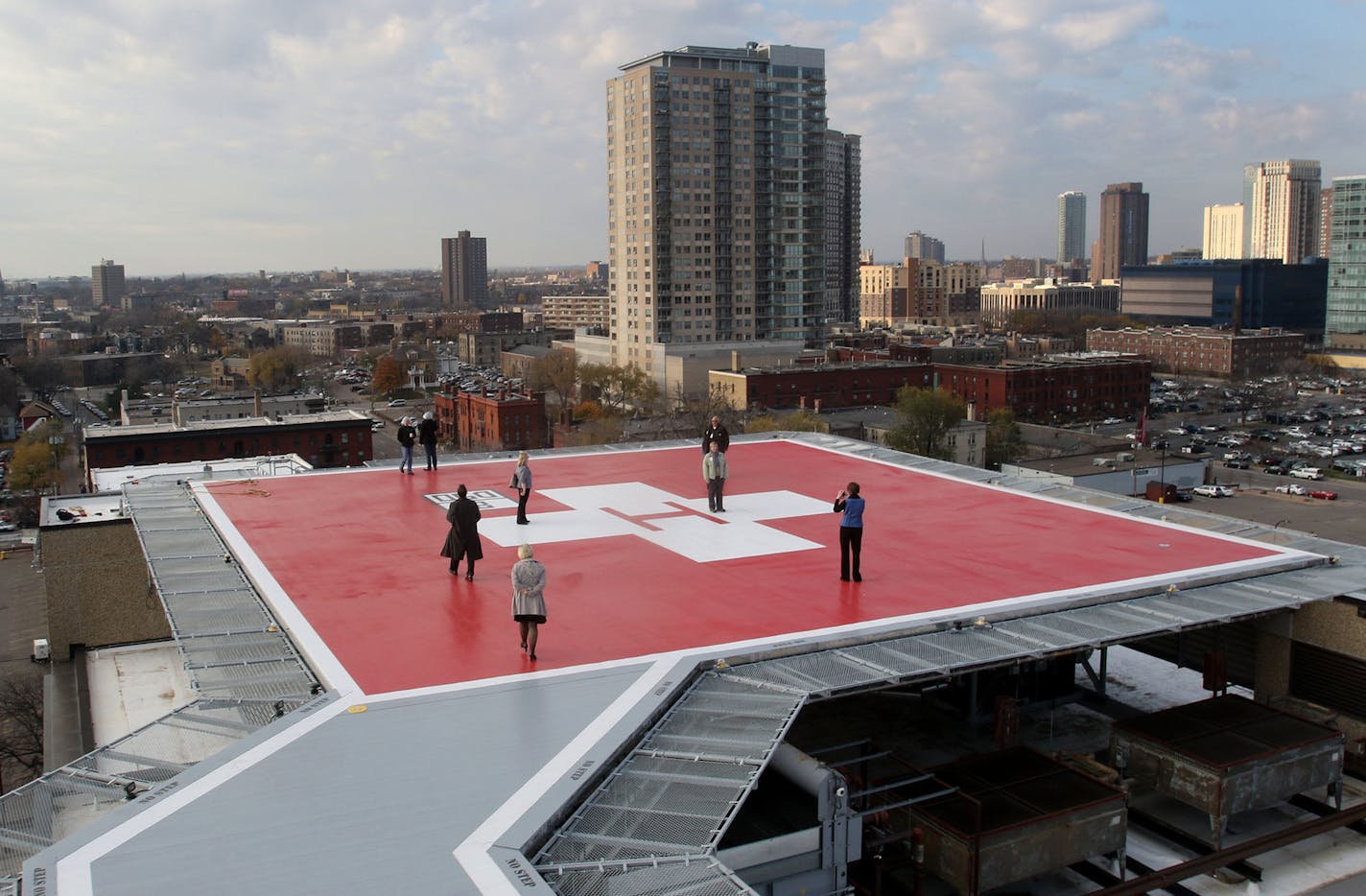 Hennepin County Medical Center opens a new $4 million helisport on Thursday in Minneapolis, MN. Here, HCMC employees check out the new helisport on the 10th floor.](DAVID JOLES/STARTRIBUNE)djoles@startribune.com Hennepin County Medical Center opens a new $4 million helisport on Thursday