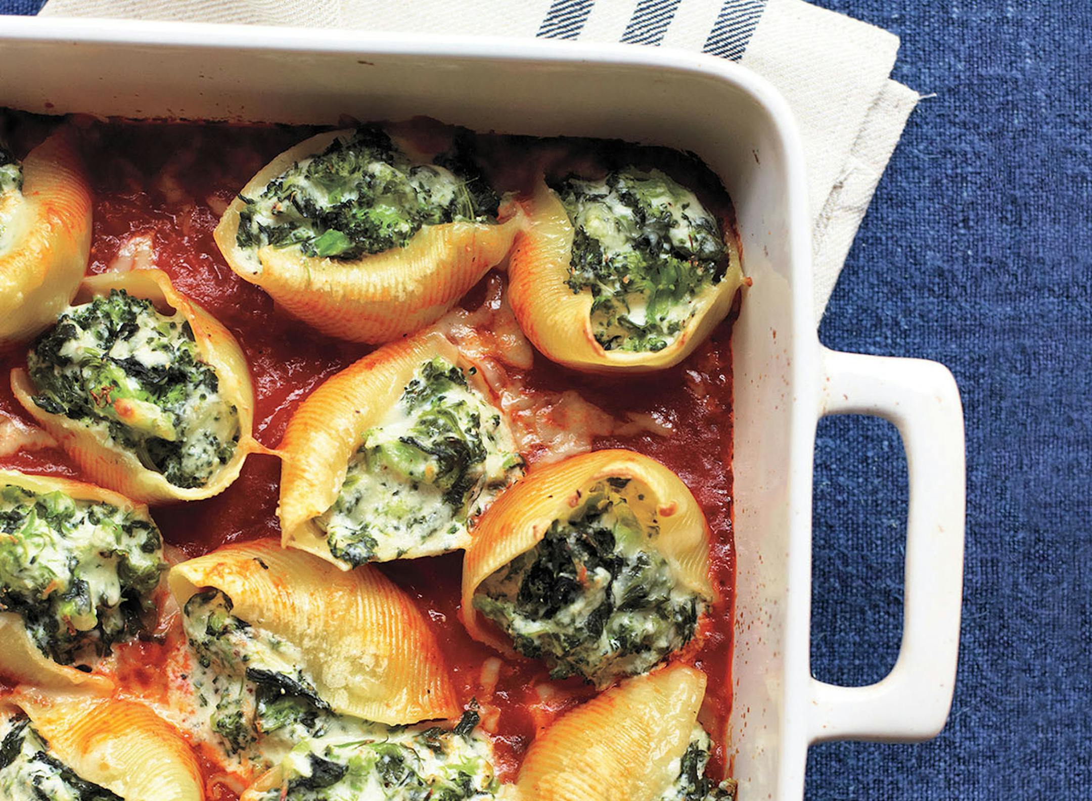 Vegetables and three-cheese stuffed shells. (Reprinted with permission from Woman's Day Easy Everyday Dinners ¬© 2013 by Hearst Books, an imprint of Sterling Publishing Co., Inc.)