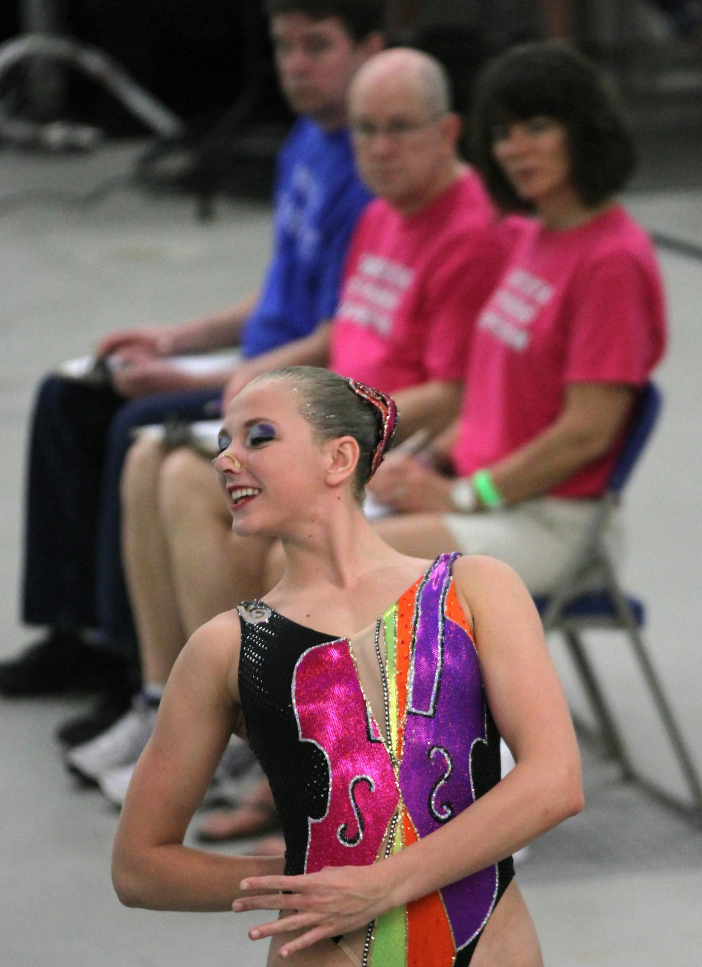 (left to right) Wayzata synchronized swimming team member Amanda Urke performed in the solo extended competition of the West Section meet at Hidden Oaks Middle School, Prior Lake on 5/18/13. Bruce Bisping/Star Tribune bbisping@startribune.com Amanda Urke/roster.