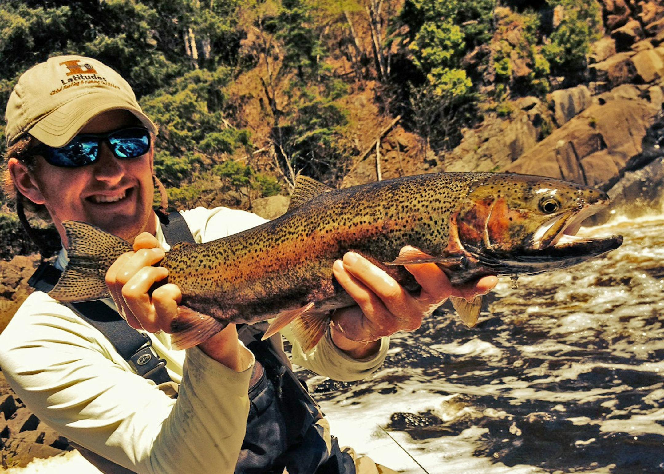 Trevor Anderson with a steelhead caught on a yarn fly early last week in a North Shore stream.