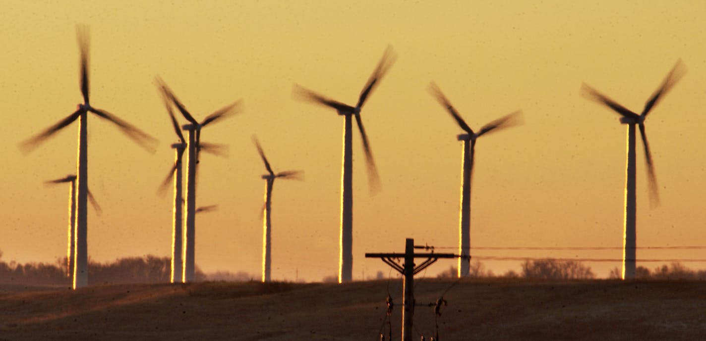 WEDNESDAY_11/12/03_Hendricks - - - - - - Wind generators turning atop the Buffalo Ridge between Hendrick and Lake Benton at sunrise. ORG XMIT: MIN2014060218205148