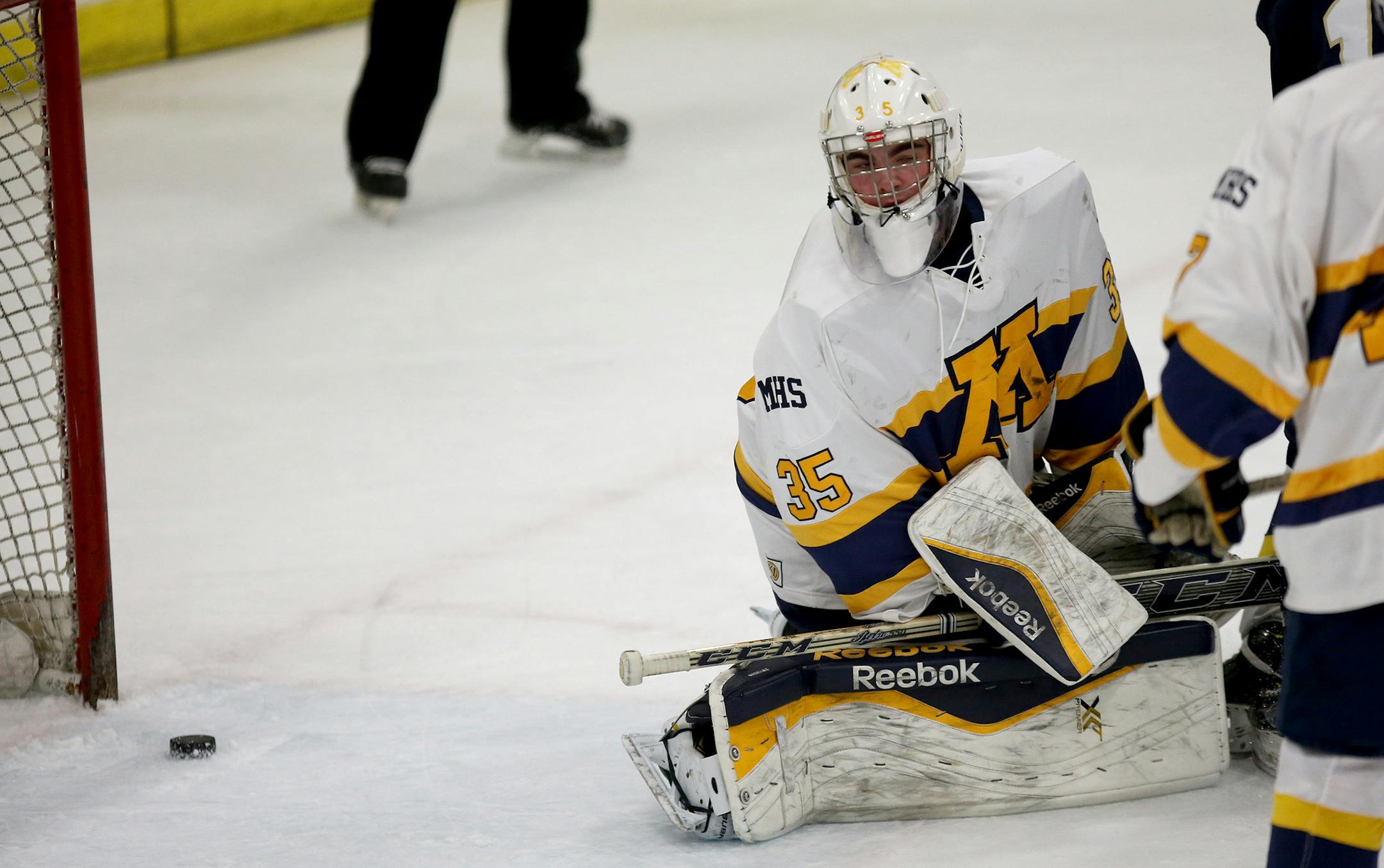 Mahtomedi's goalie Will Swanson was scored on by St. Paul Academy in the first period. ] (KYNDELL HARKNESS/STAR TRIBUNE) kyndell.harkness@startribune.com St. Paul Academy vs Mahtomedi in sectional finals in Roseville , Min., Friday, February 27, 2015.