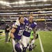 Minnesota Vikings linebacker Chad Greenway, left, and tight end Kyle Rudolph ran off the field together after a 38-10 win against the Chicago Bears at