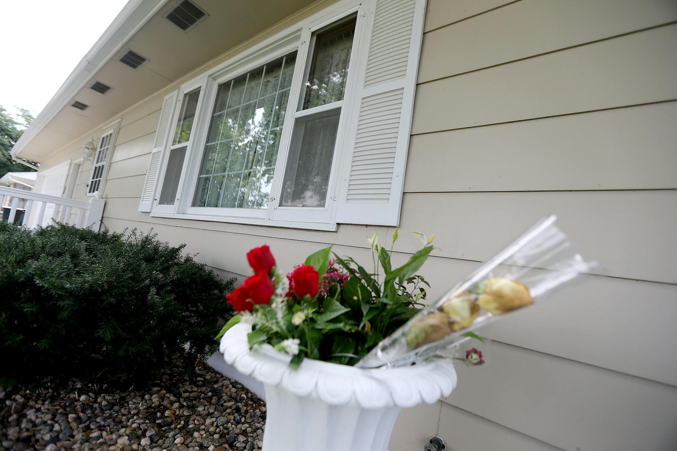 Flowers sat outside the home of Lila Warwick, 79, Thursday, in Willmar.
