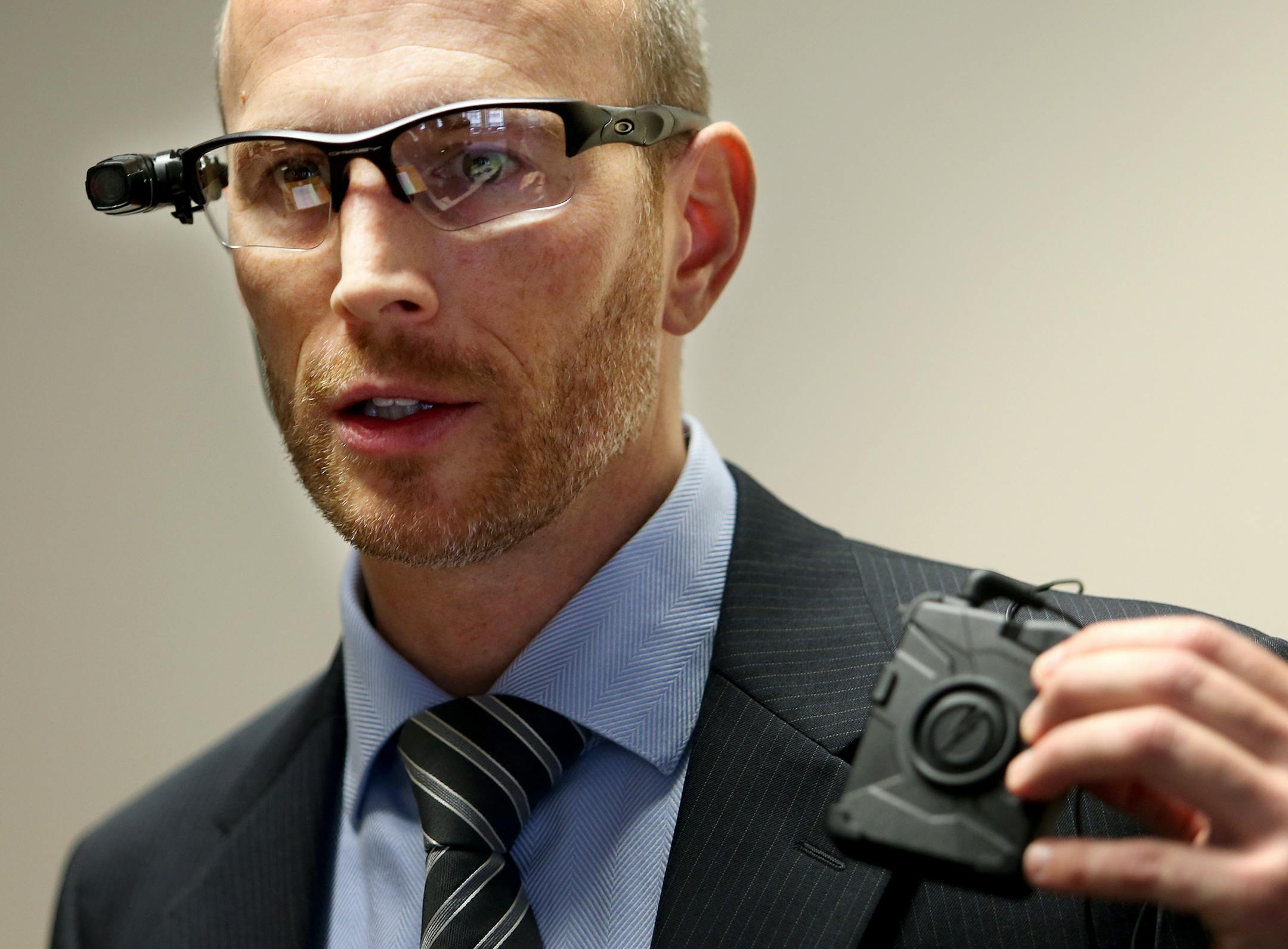 City Councilman Gary Schiff wore the body cam system at the press conference. Minneapolis, MN on October 17, 2013. ] JOELKOYAMA‚Ä¢joel koyama@startribune City Council member Betsy Hodges hold news conference to discuss pilot program for body cam system to be worn by Minneapolis cops on the same day a police spokesman denied there is any news on the issue. "It's not even looking like we're even close." Cyndi Barrington said.