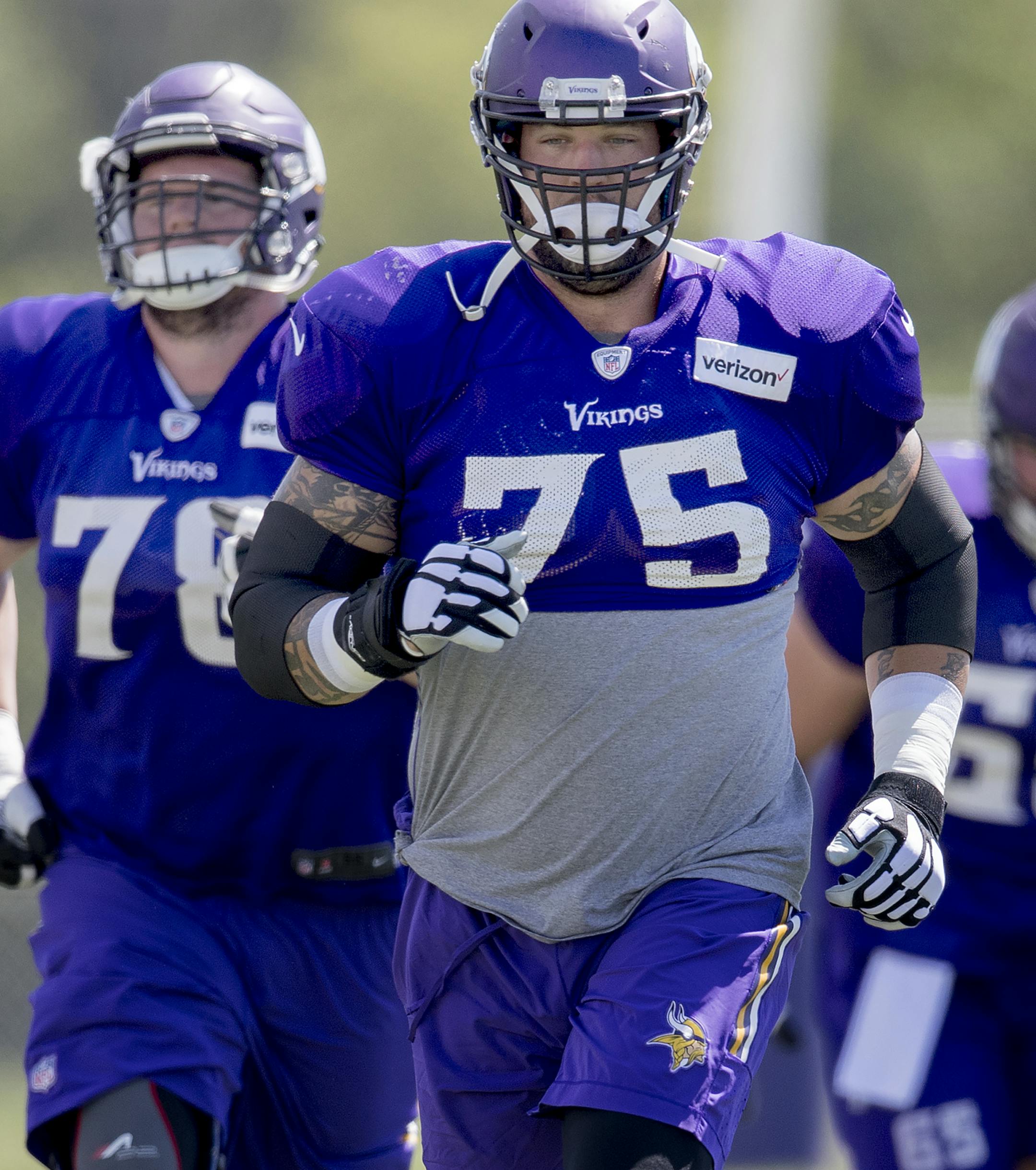 Minnesota Vikings offensive lineman Alex Boone (75) ran to the next drill during the afternoon practice on Friday. ] CARLOS GONZALEZ ï cgonzalez@startribune.com - August 4, 2017, Mankato, MN, Minnesota State University Mankato, Minnesota Vikings Training Camp, NFL ORG XMIT: MIN1708041643439628