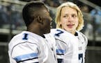 Blaine quarterback Connor Melton (7) chats on the bench with receiver Byron Bynum Jr., during a state tournament game last fall. Melton got the 2017 s