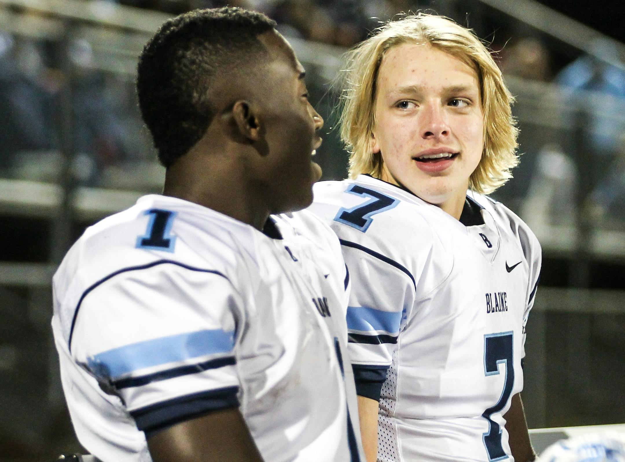Blaine quarterback Connor Melton (7) chats on the bench with receiver Byron Bynum Jr., during a state tournament game last fall. Melton got the 2017 season off to a big start in a victory against Stillwater.
