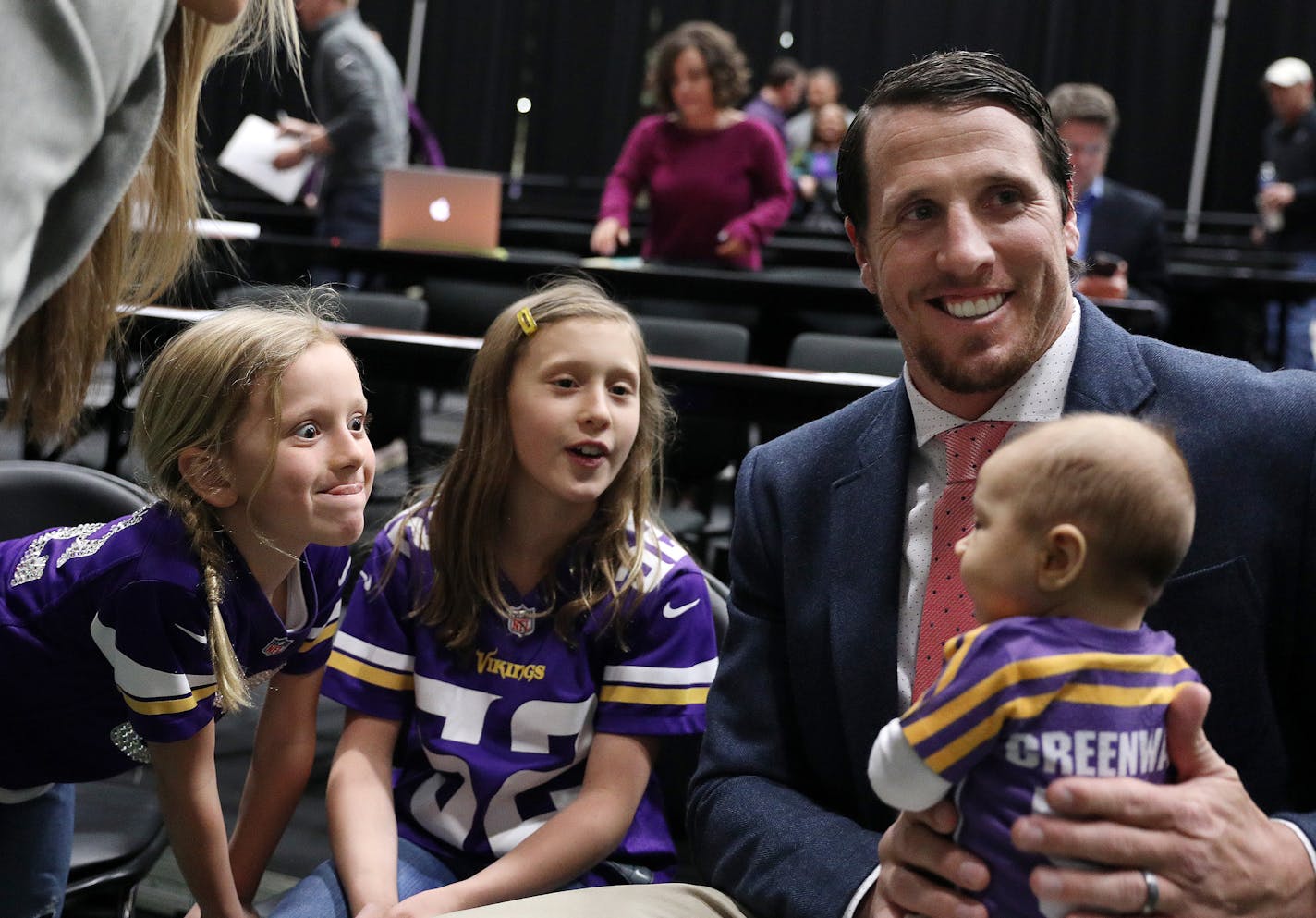 Minnesota Vikings linebacker Chad Greenway holds his youngest daughter, Carsyn, 3-months, as other daughters, Maddy, left, 9, and Beckett, 6, made faces at her following the press conference Tuesday. ] ANTHONY SOUFFLE &#xef; anthony.souffle@startribune.com Minnesota Vikings linebacker Chad Greenway officially announced his retirement form the NFL during a press conference Tuesday, March 7, 2017 at the Vikings' Winter Park headquarters in Eden Prairie, Minn.