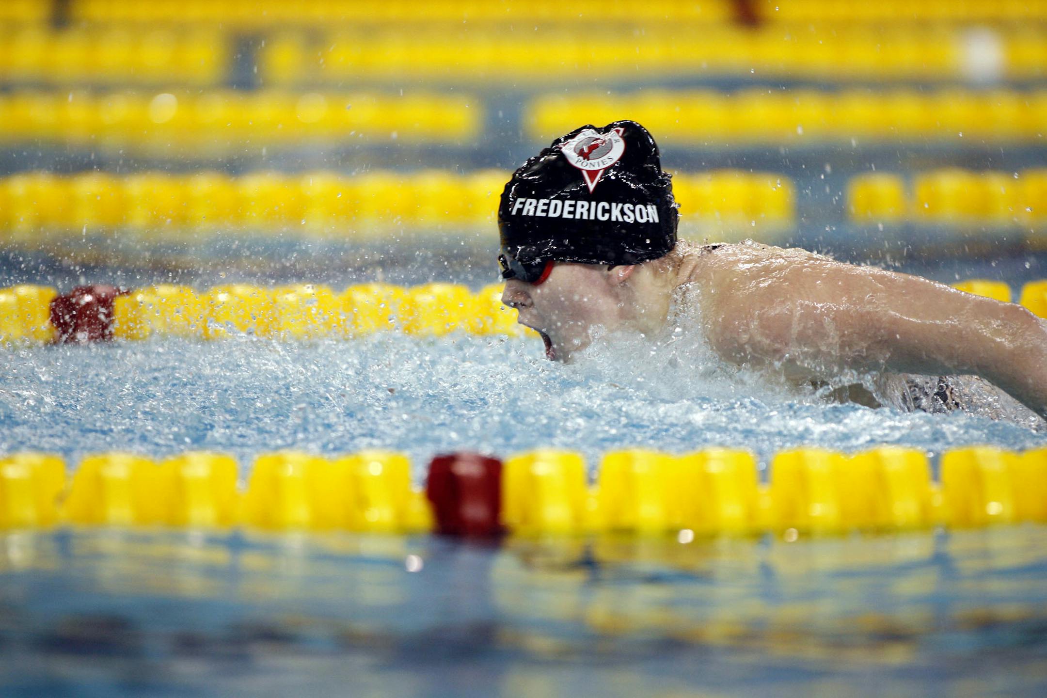 RENEE JONES SCHNEIDER • reneejones@startribune.com
Minneapolis, MN - November 22, 2006 - Stillwater's Rachel Frederickson raced in the 100-yard butterfly. She won the race and currently holds the state record from a previous meet.